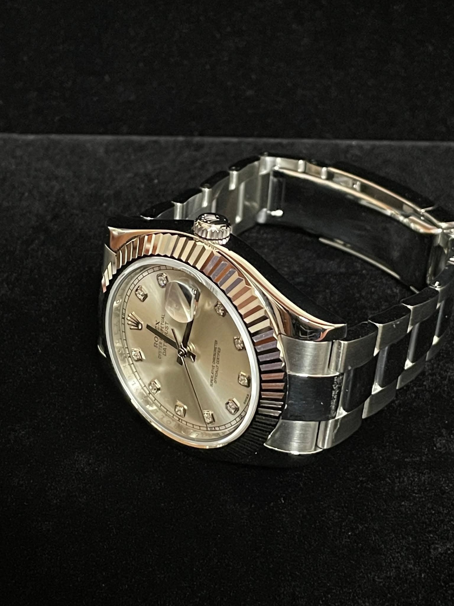 May be an image of wrist watch and text