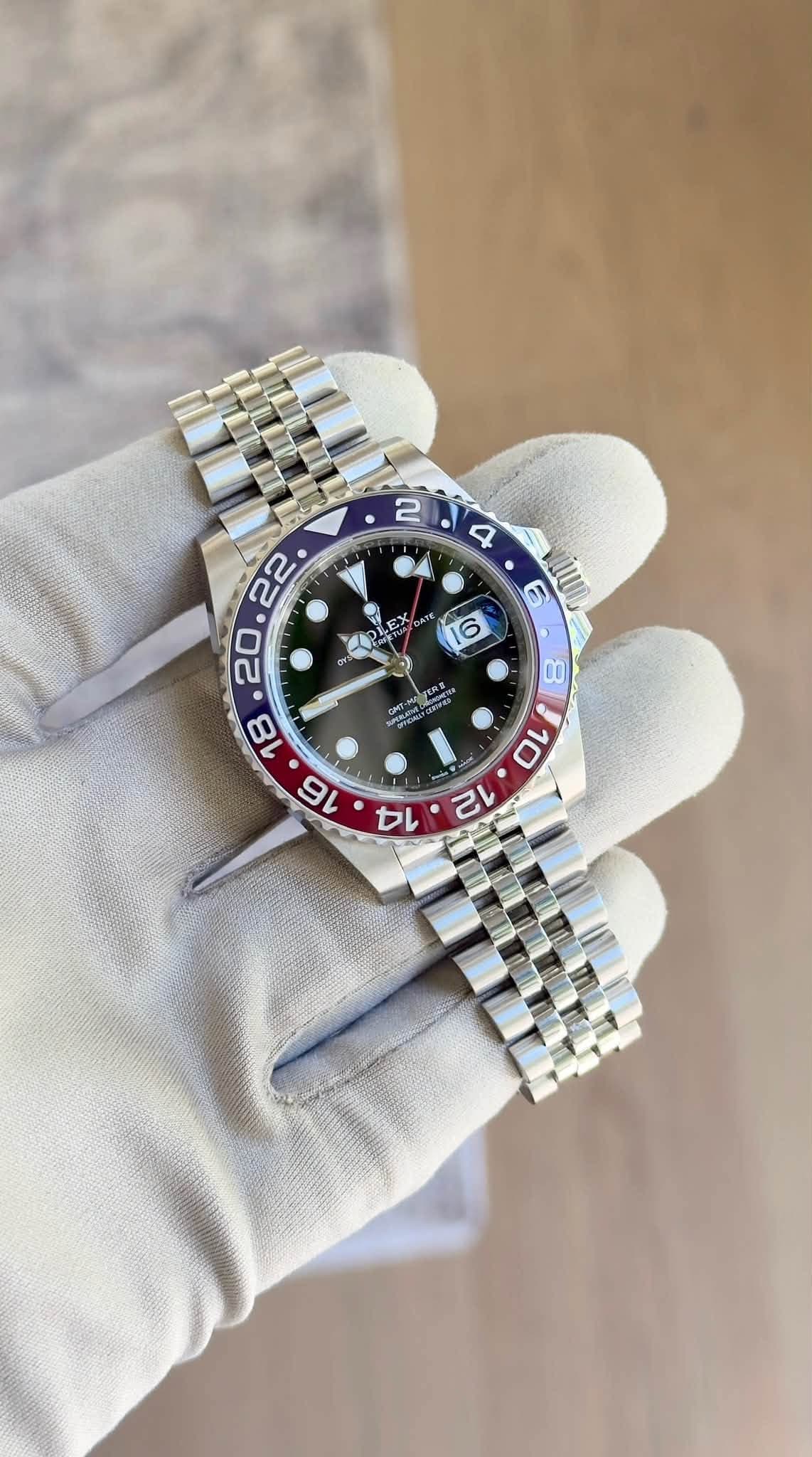 May be an image of wrist watch and text
