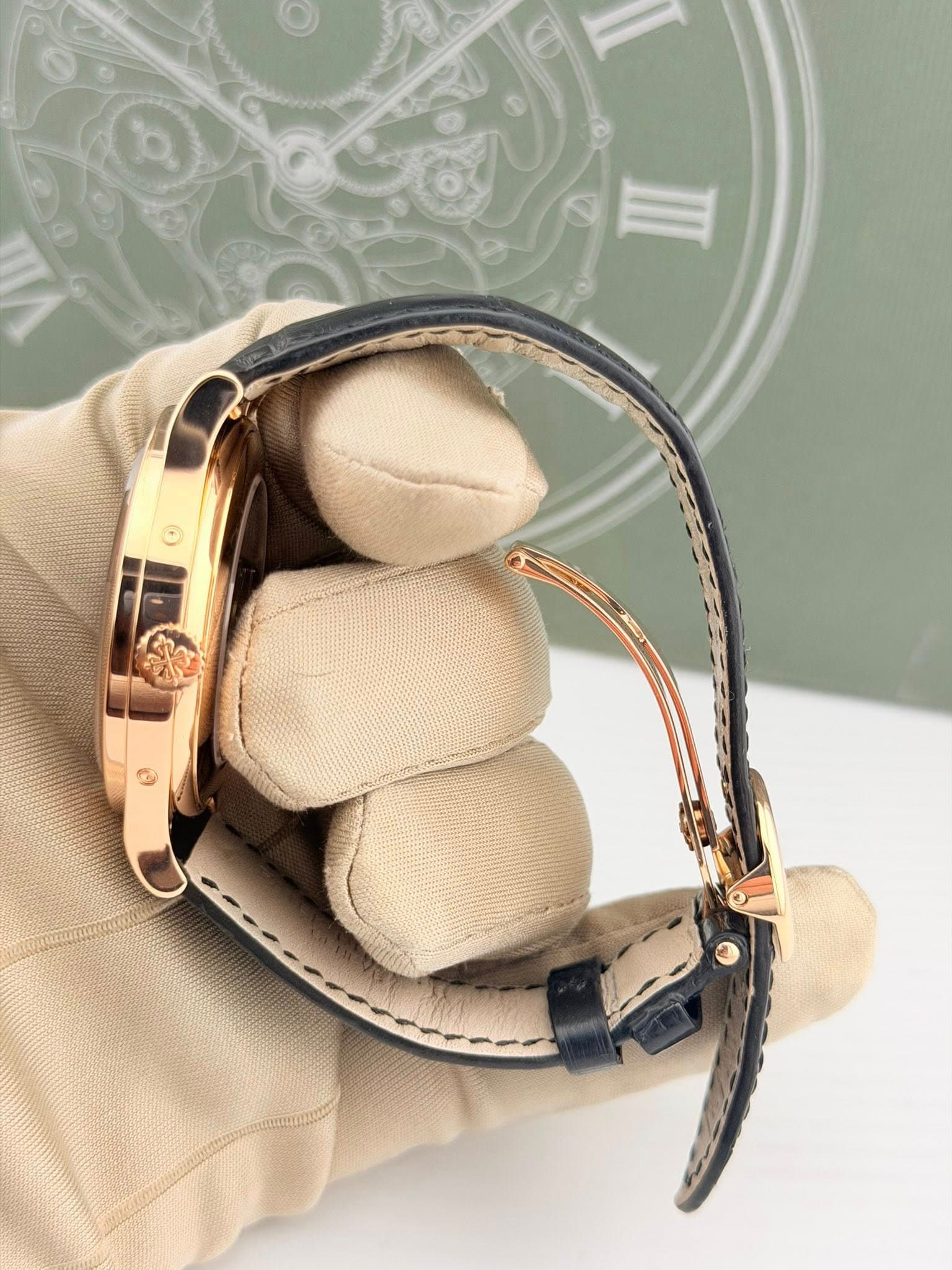 May be an image of wrist watch and leather