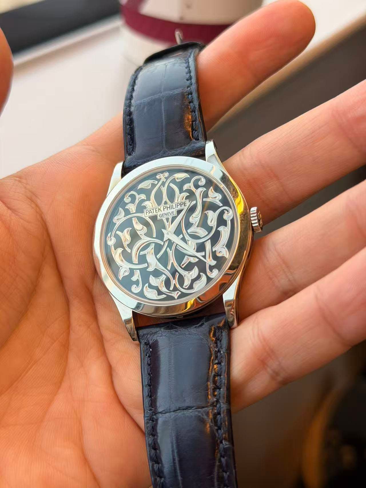 May be an image of wrist watch and text