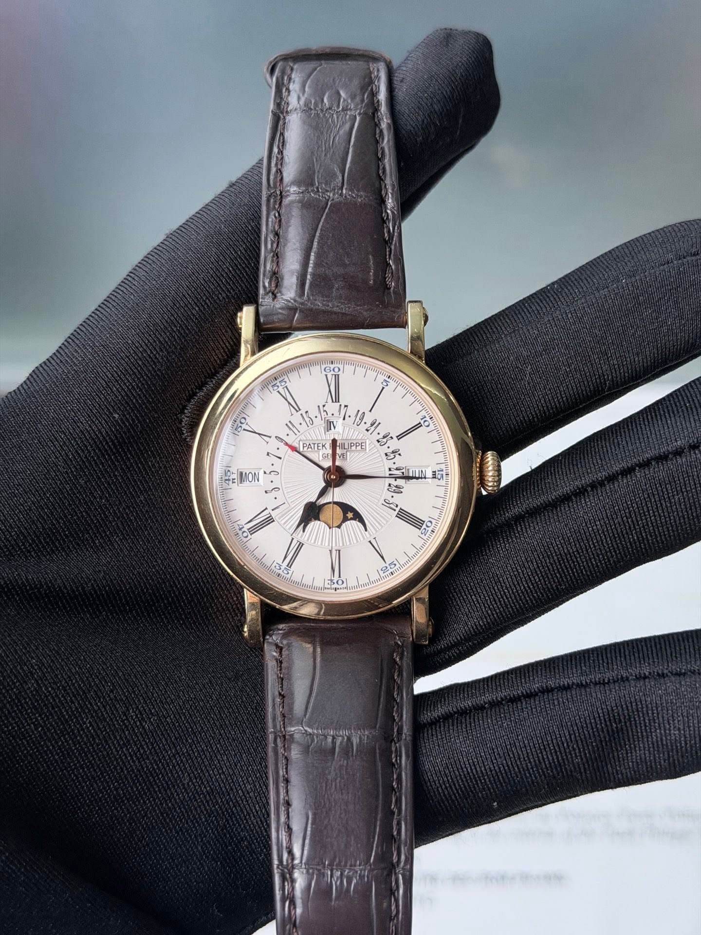 May be an image of wrist watch and text