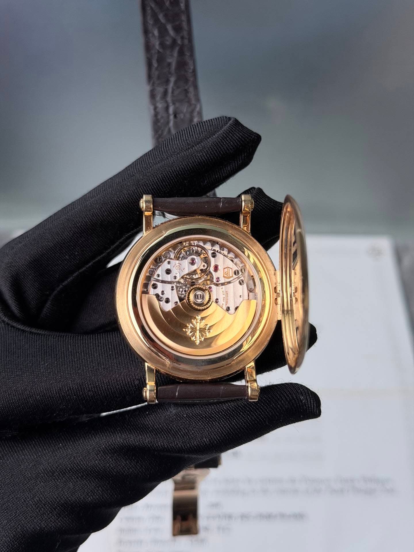 May be an image of wrist watch and text