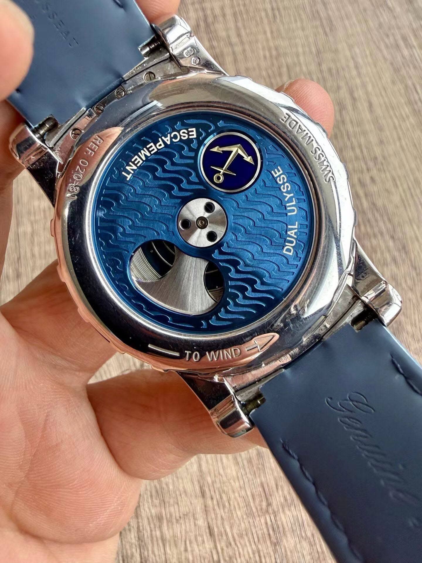 May be an image of wrist watch and text