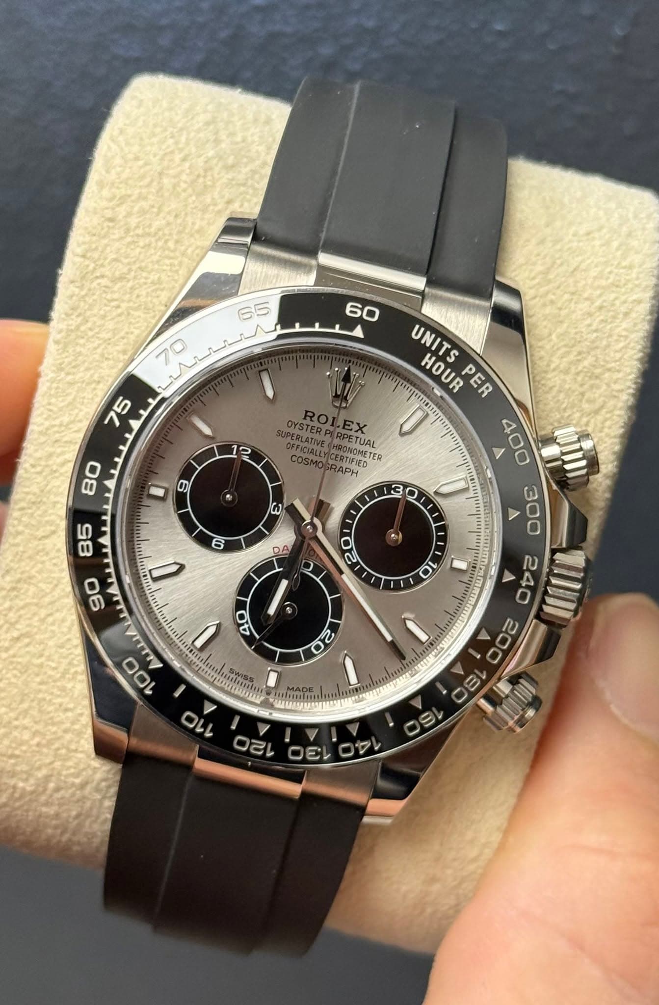 May be an image of wrist watch and text