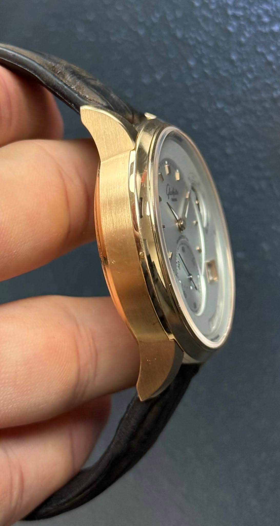 May be an image of wrist watch