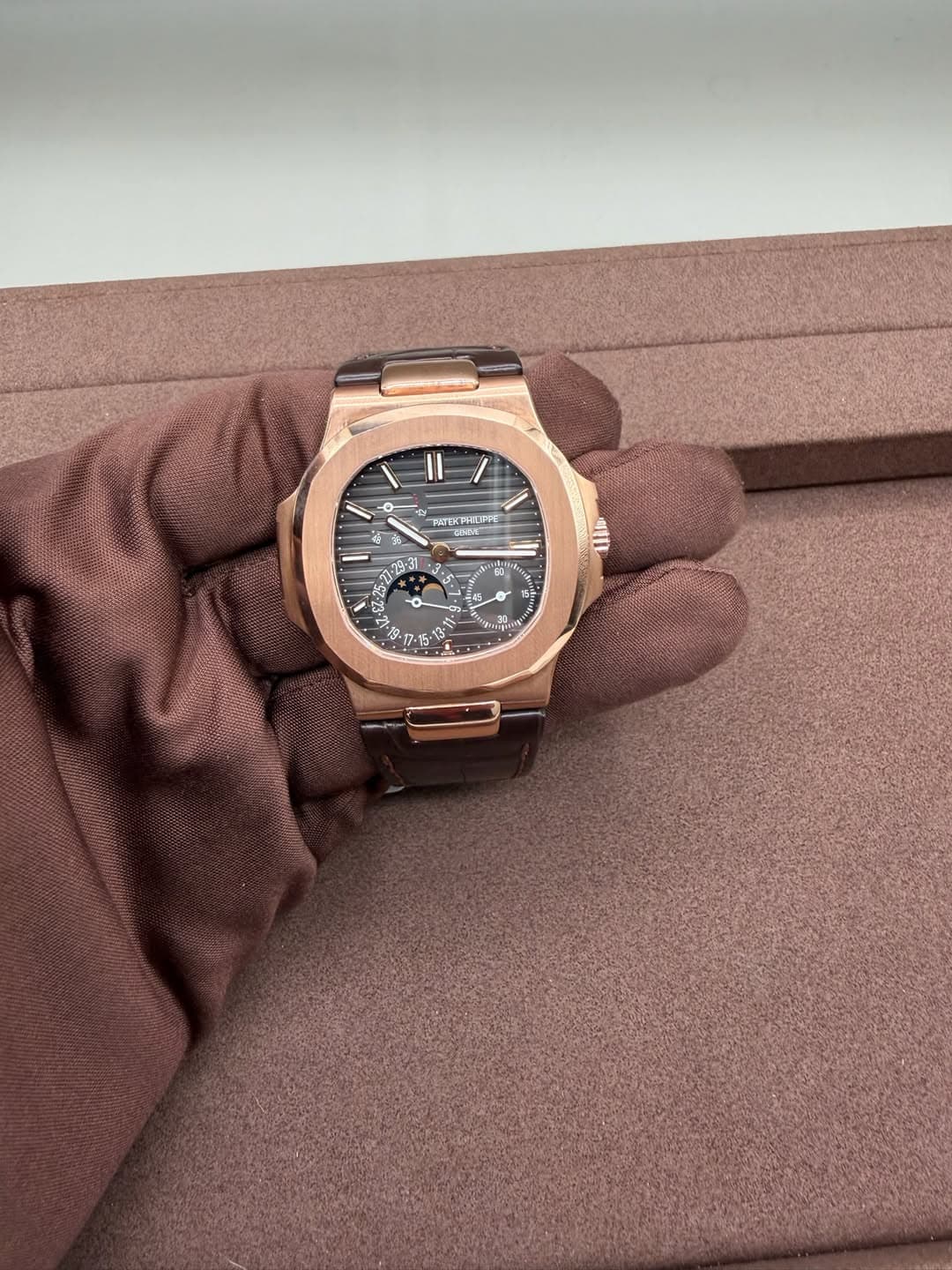 May be an image of wrist watch and text