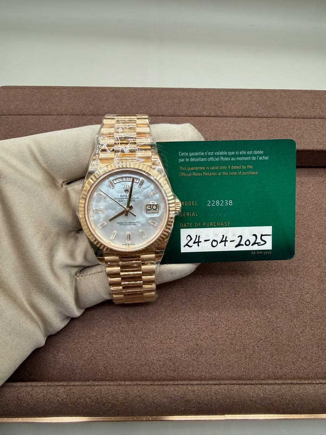 May be an image of wrist watch and text