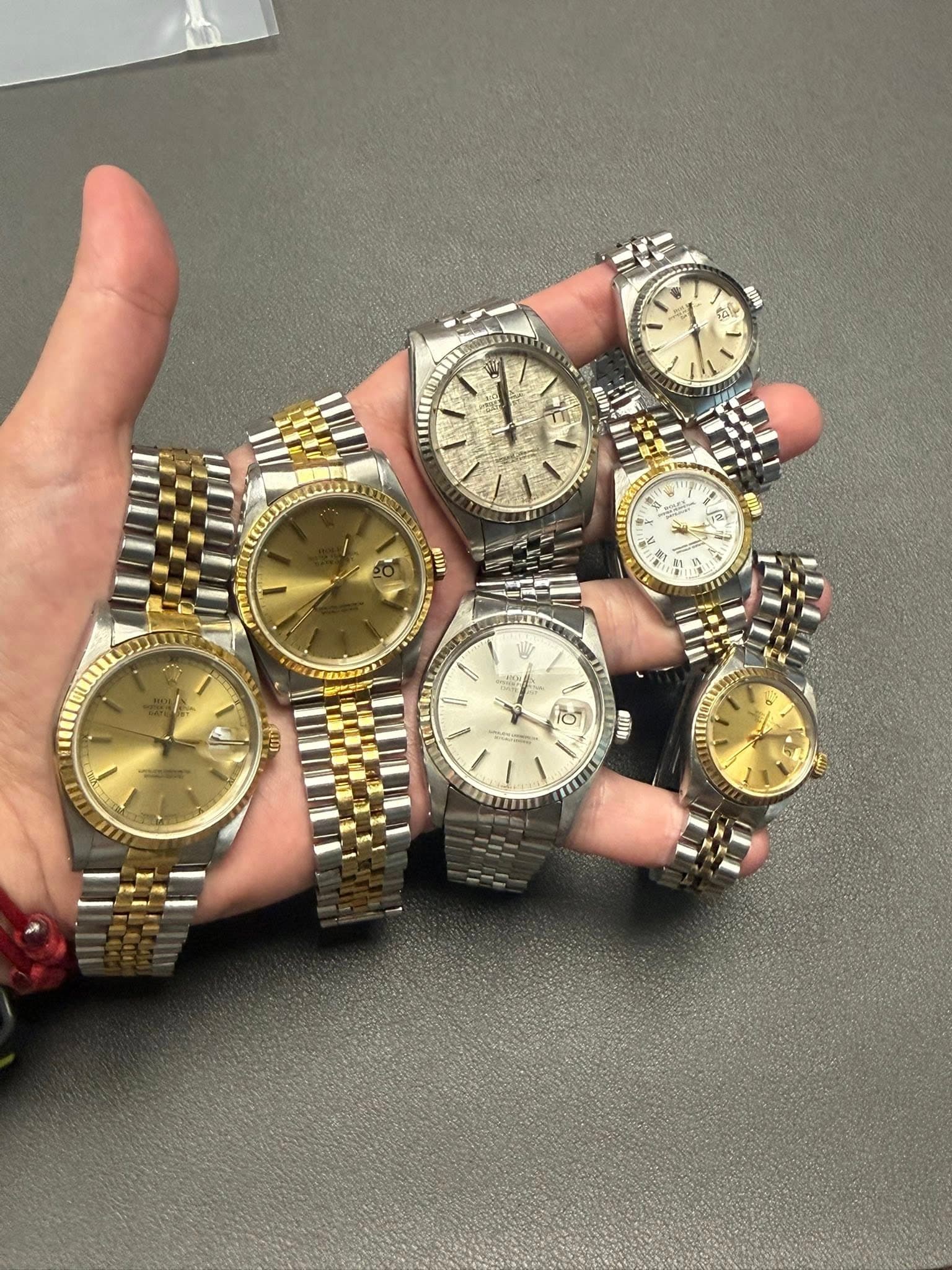 May be an image of wrist watch and text