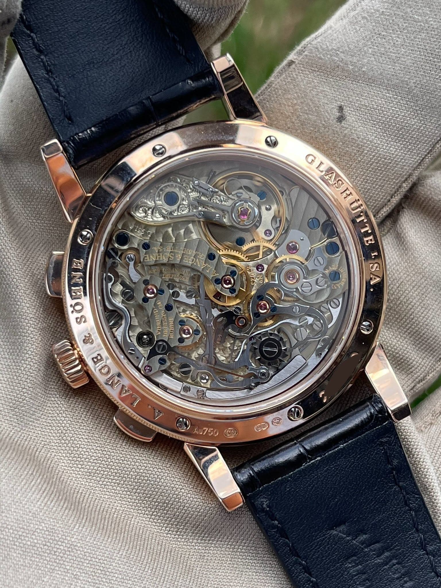 May be an image of wrist watch and text that says 'GNHGS GLASHUTTR G LAS GLASH TT SA سن G ثز ANEOS 이번 10 ن ဟ TD OE 8 D 6 7 750'