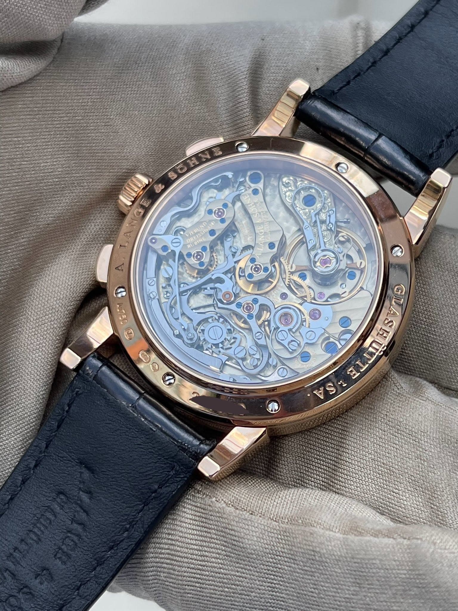 May be an image of wrist watch and text