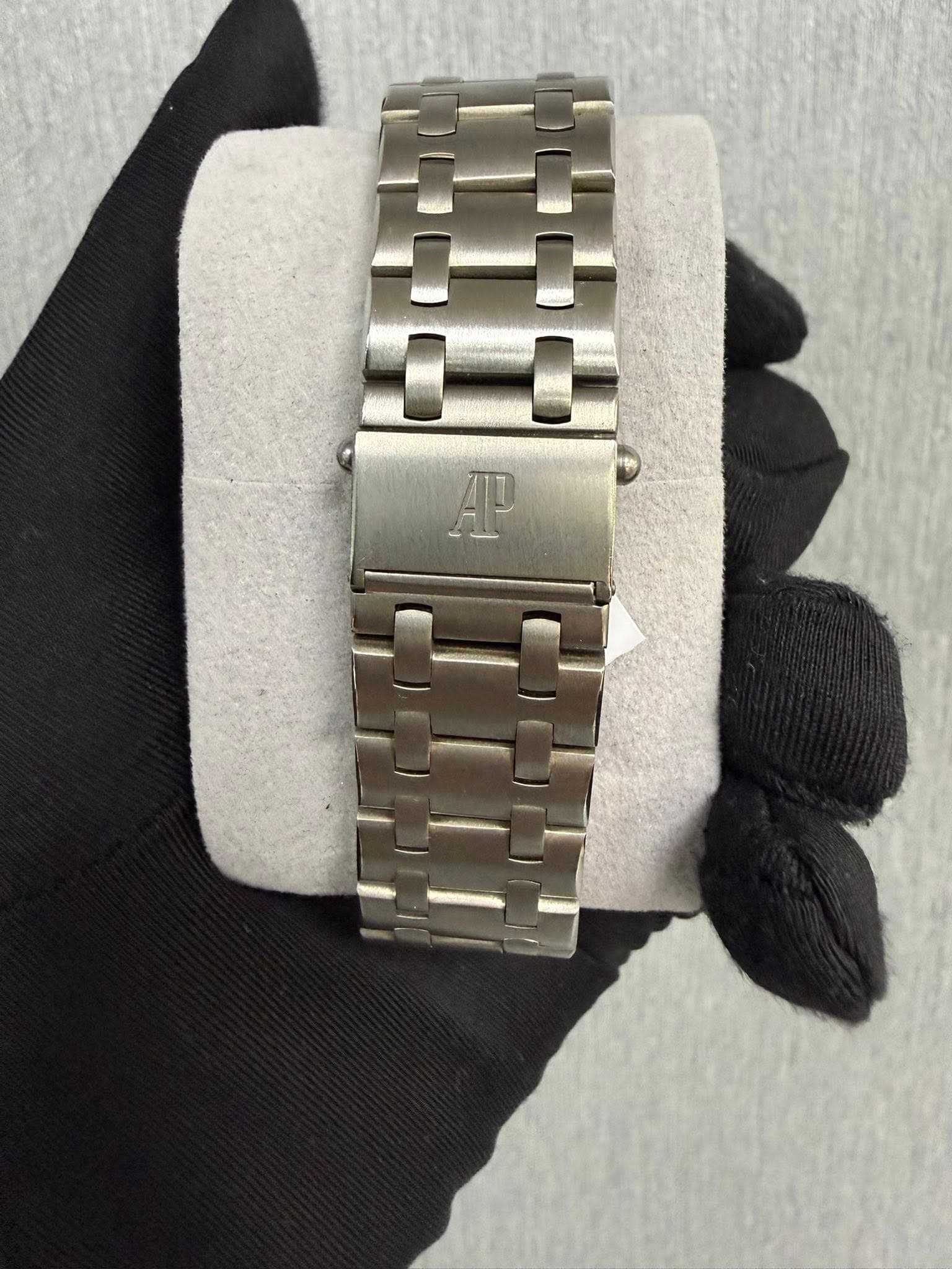 May be an image of wrist watch and text that says 'AP'