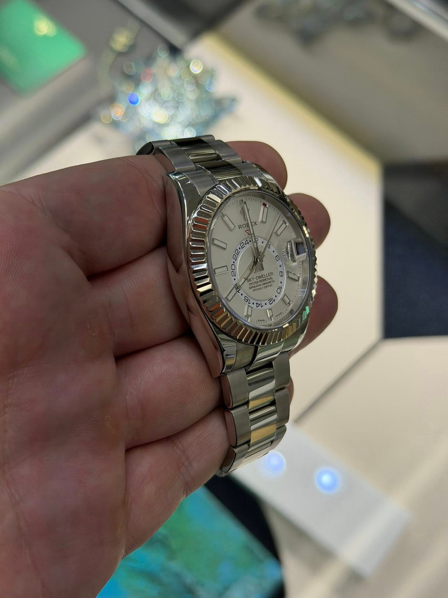May be an image of wrist watch and text