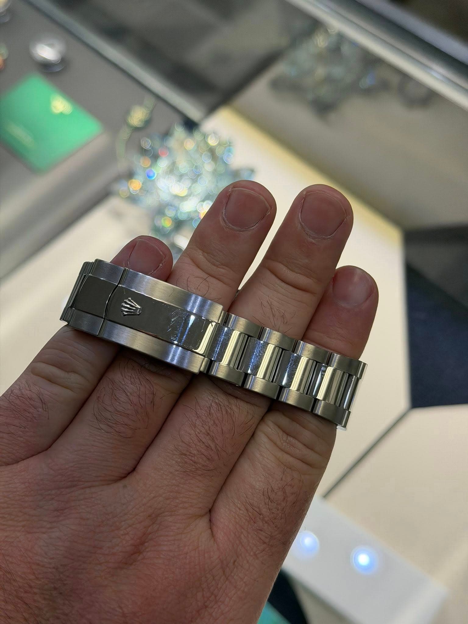 May be an image of wrist watch and ring