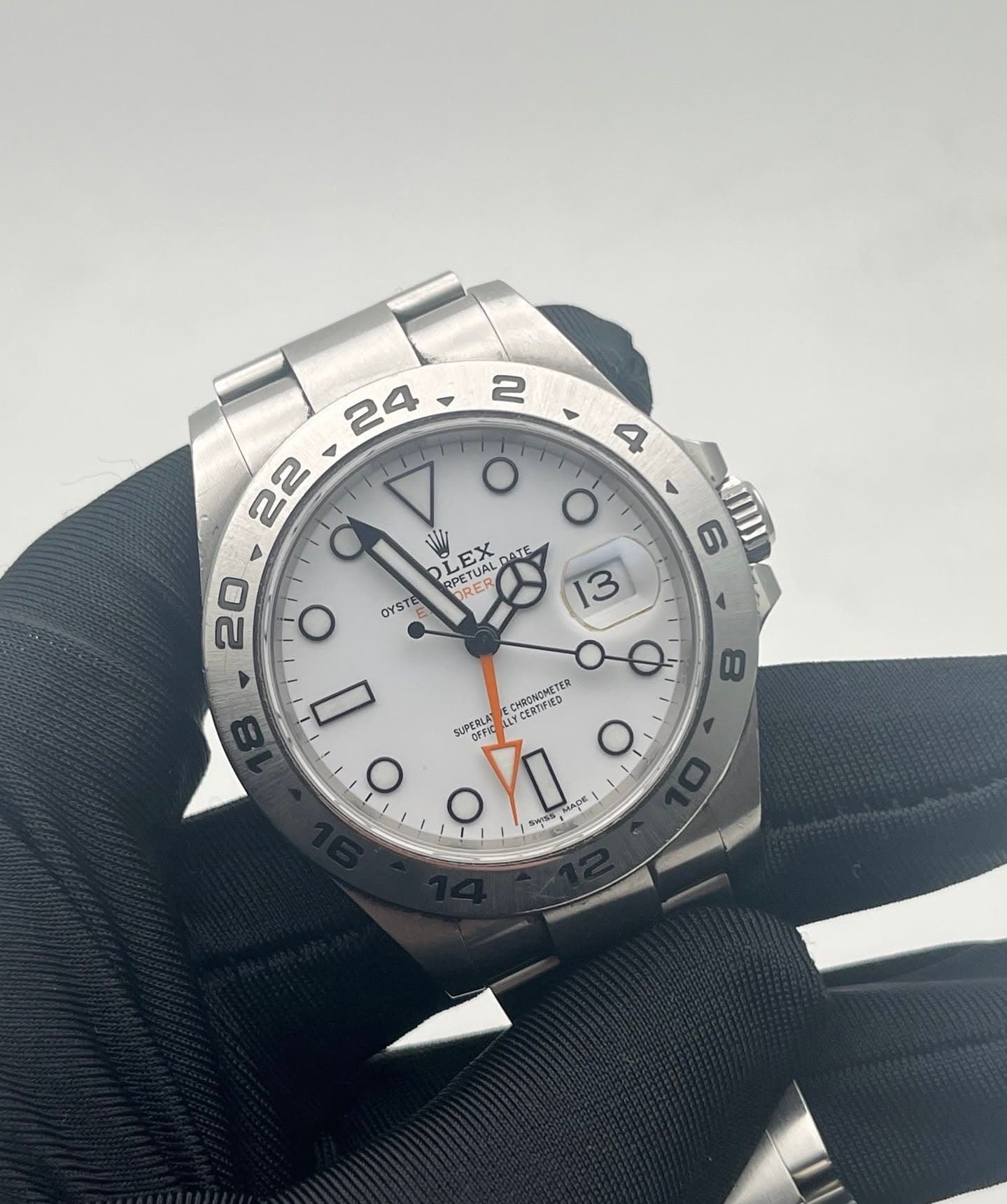May be an image of wrist watch and text