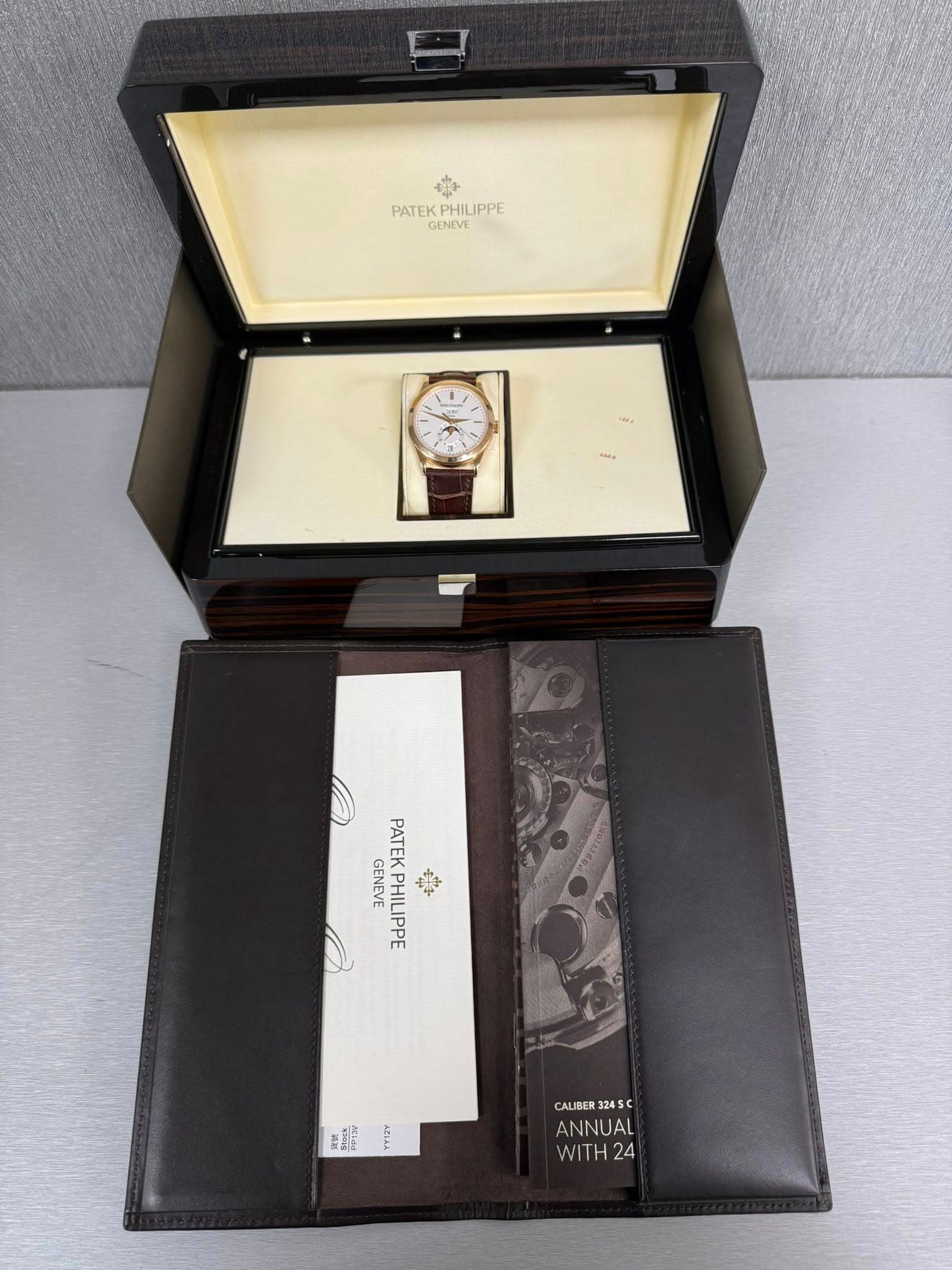 May be an image of wrist watch and text that says 'PATEKPHILIPPE PATEKPHIUPPE PATEK PHILIPPE GENEVE T PATEK 奇工 GENEVE PHILIPPE PATEKPHILIPPE PHII 掛 安 사 CALIBER 3245C ANNUAL WITH24…