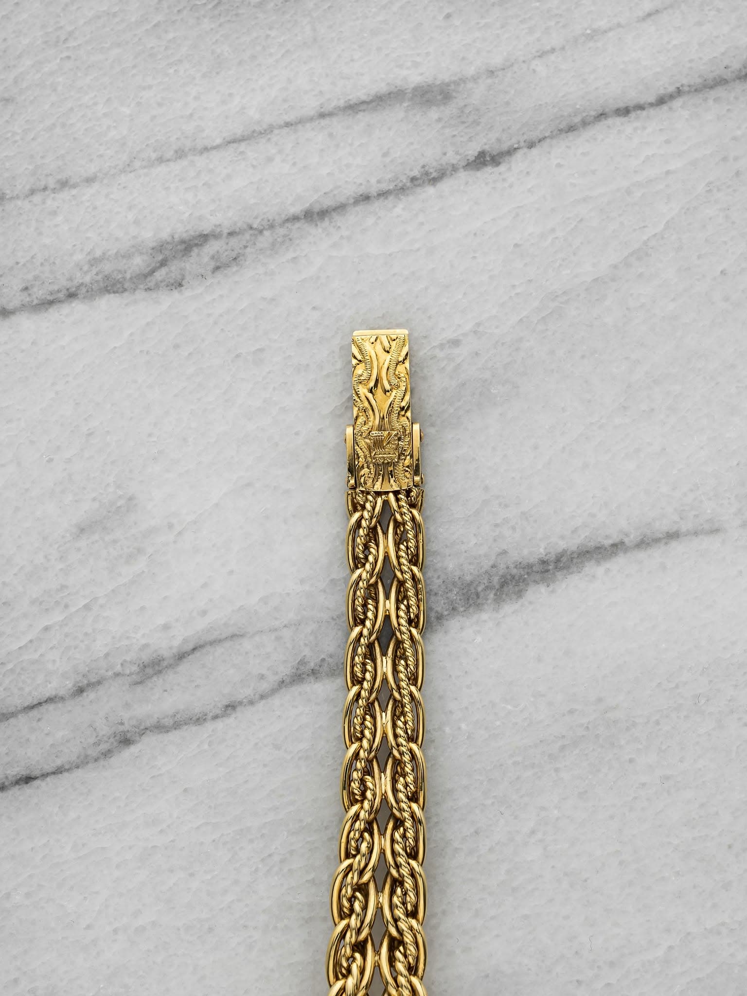 May be an image of jewelry and brass