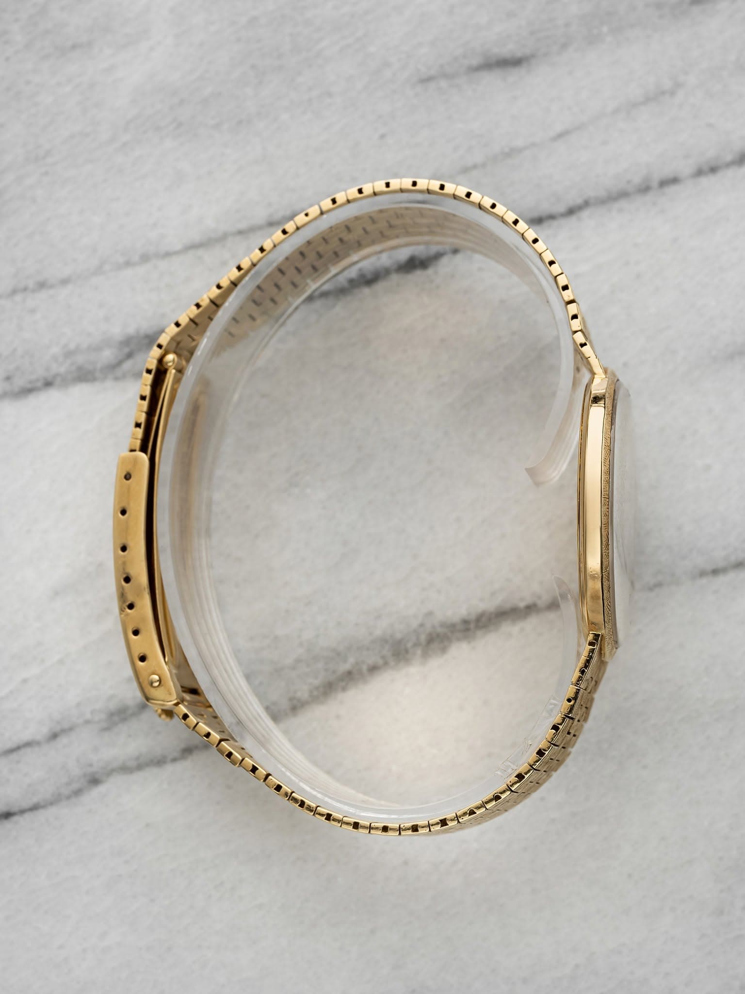 May be an image of jewelry and wrist watch