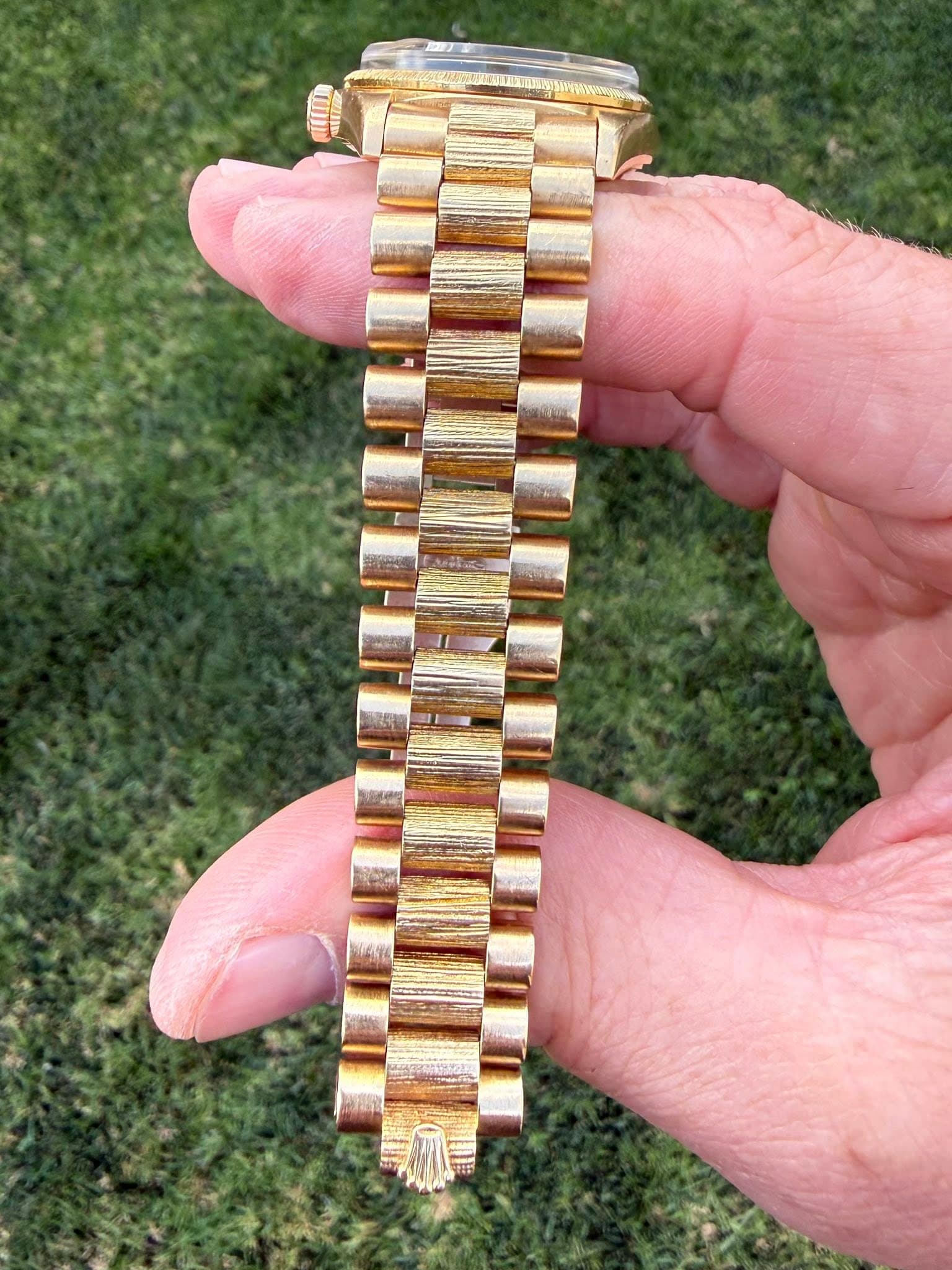 May be an image of wrist watch