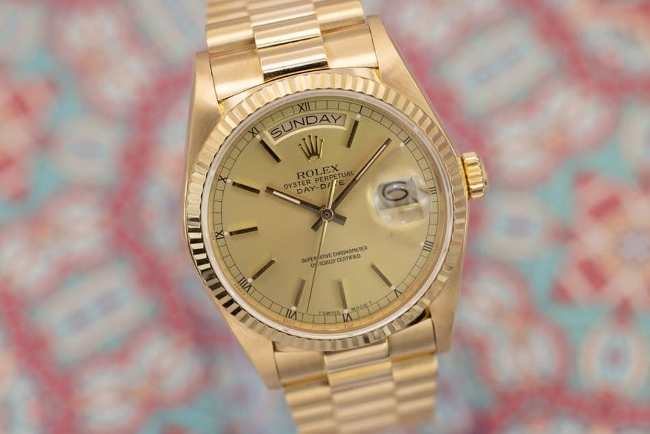 May be an image of wrist watch and text that says 'SUNDAY W ROLEX PERPETUAL TUAL OYSTER ROPERPETUAL STERPERP PERPE PERPE DAY-D 6 ATTVE CHRONOMETER CERTIFIED SUPEP ACIALILY IIII…