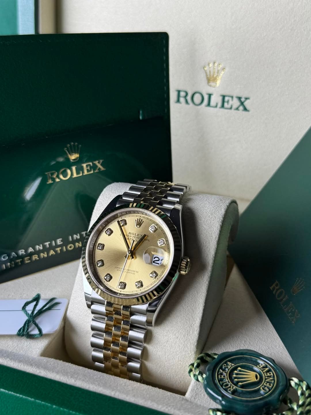 May be an image of wrist watch and text