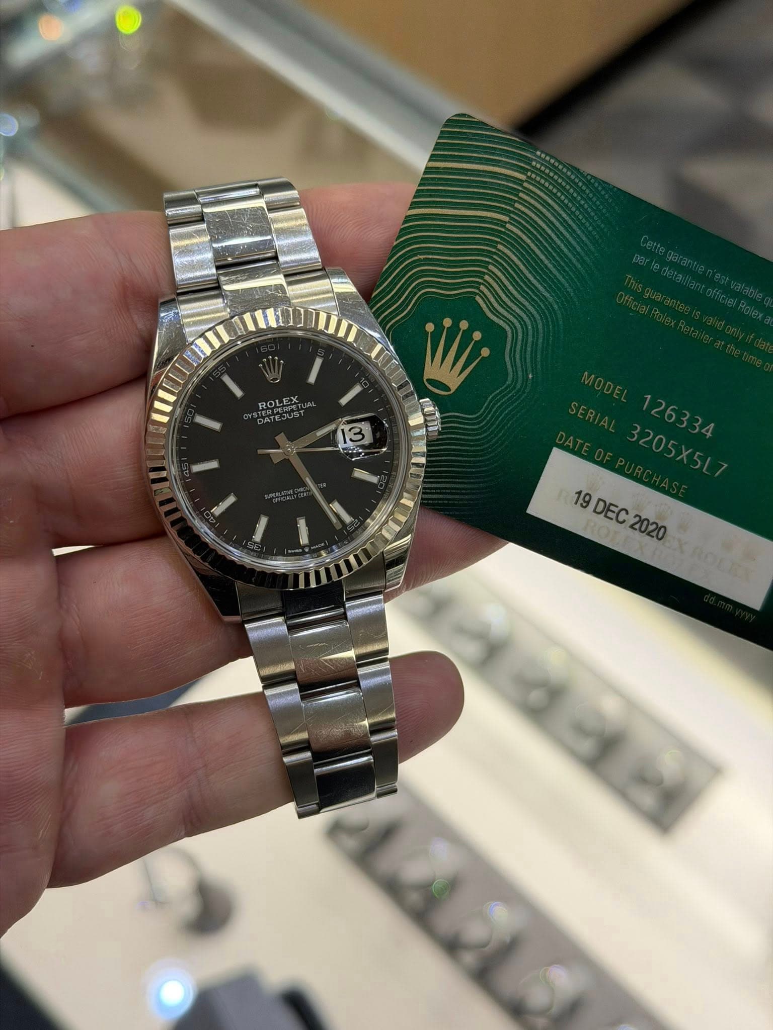 May be an image of wrist watch and text that says 'ROLEX 13 19 19DEC2020 19DEC2020'