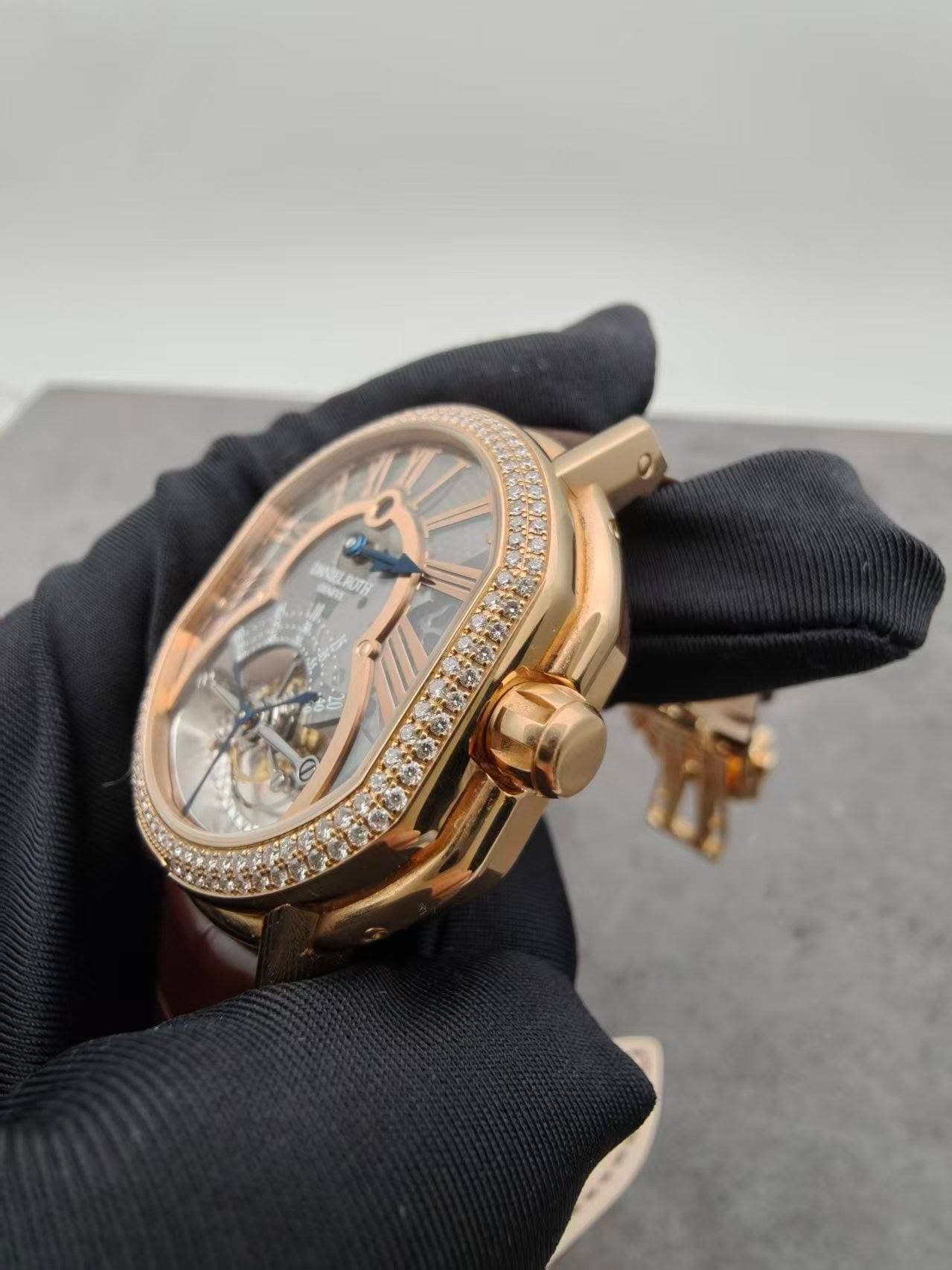 May be an image of wrist watch and text