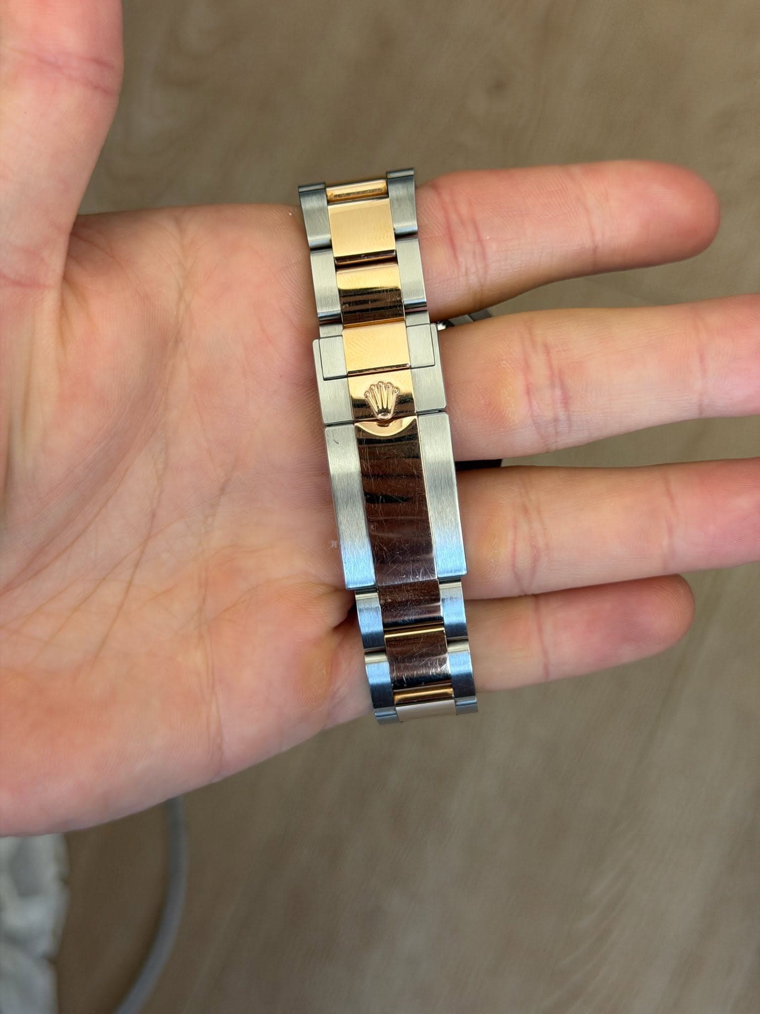 May be an image of wrist watch