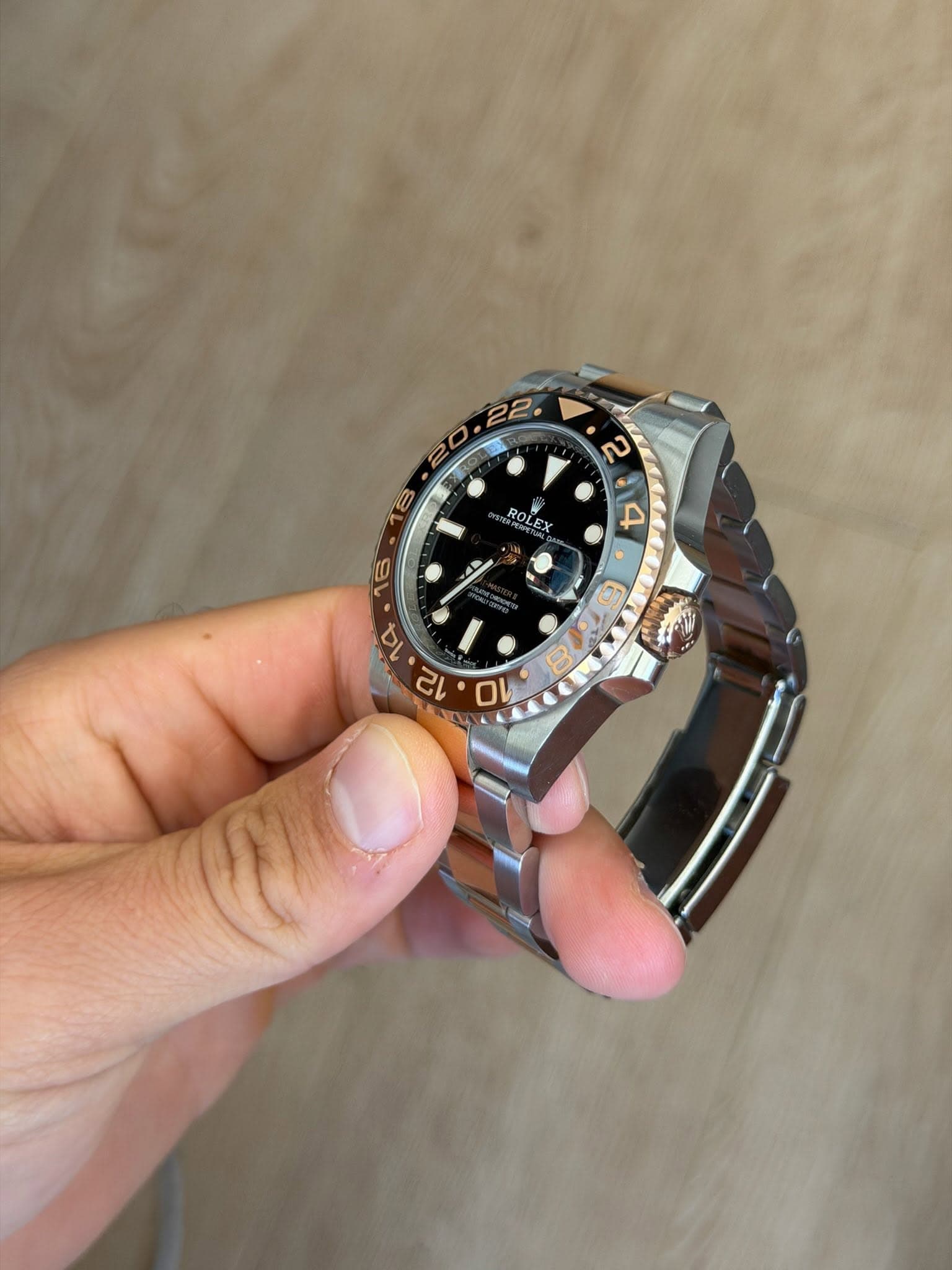 May be an image of wrist watch and text