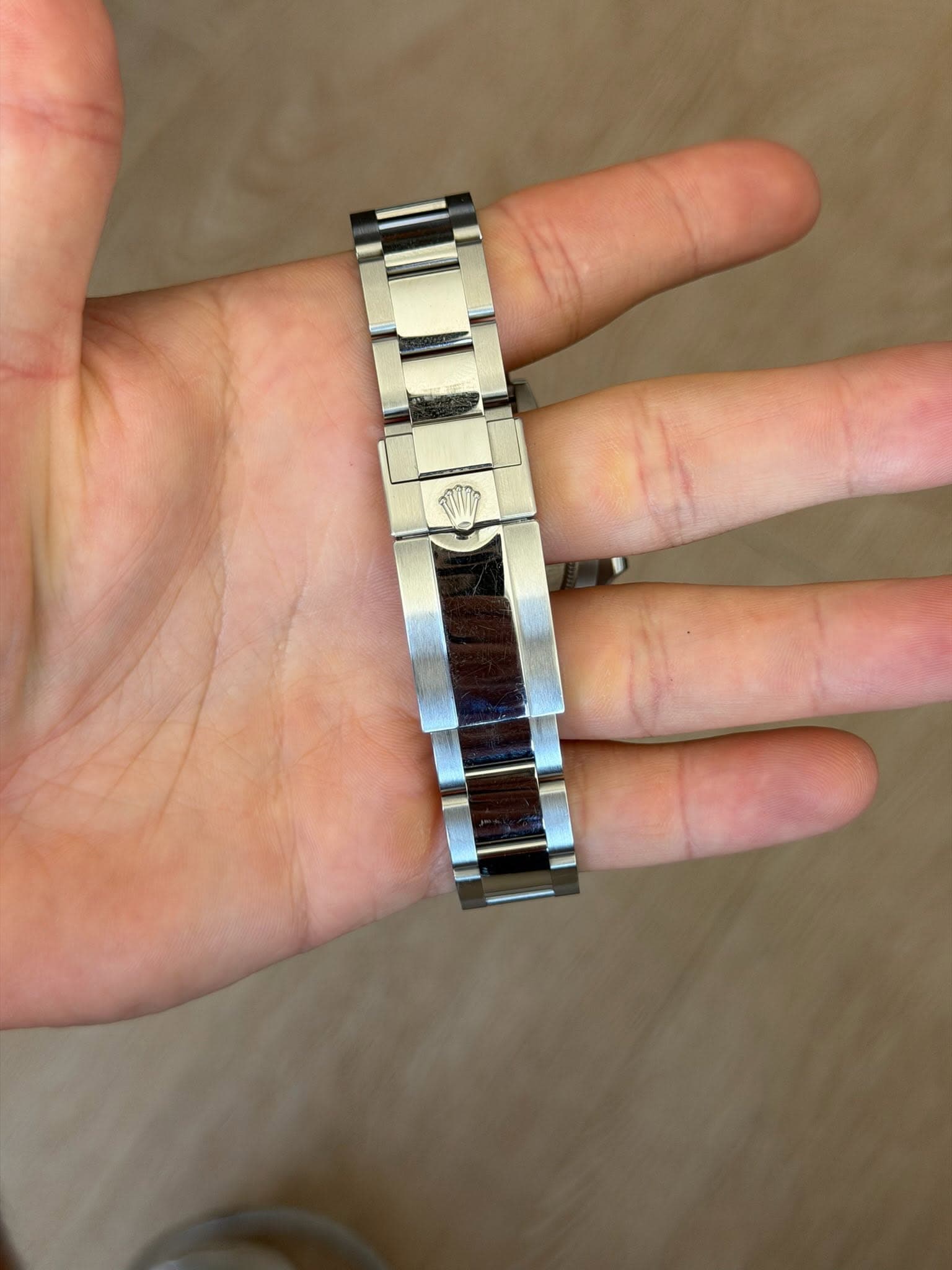 May be an image of wrist watch