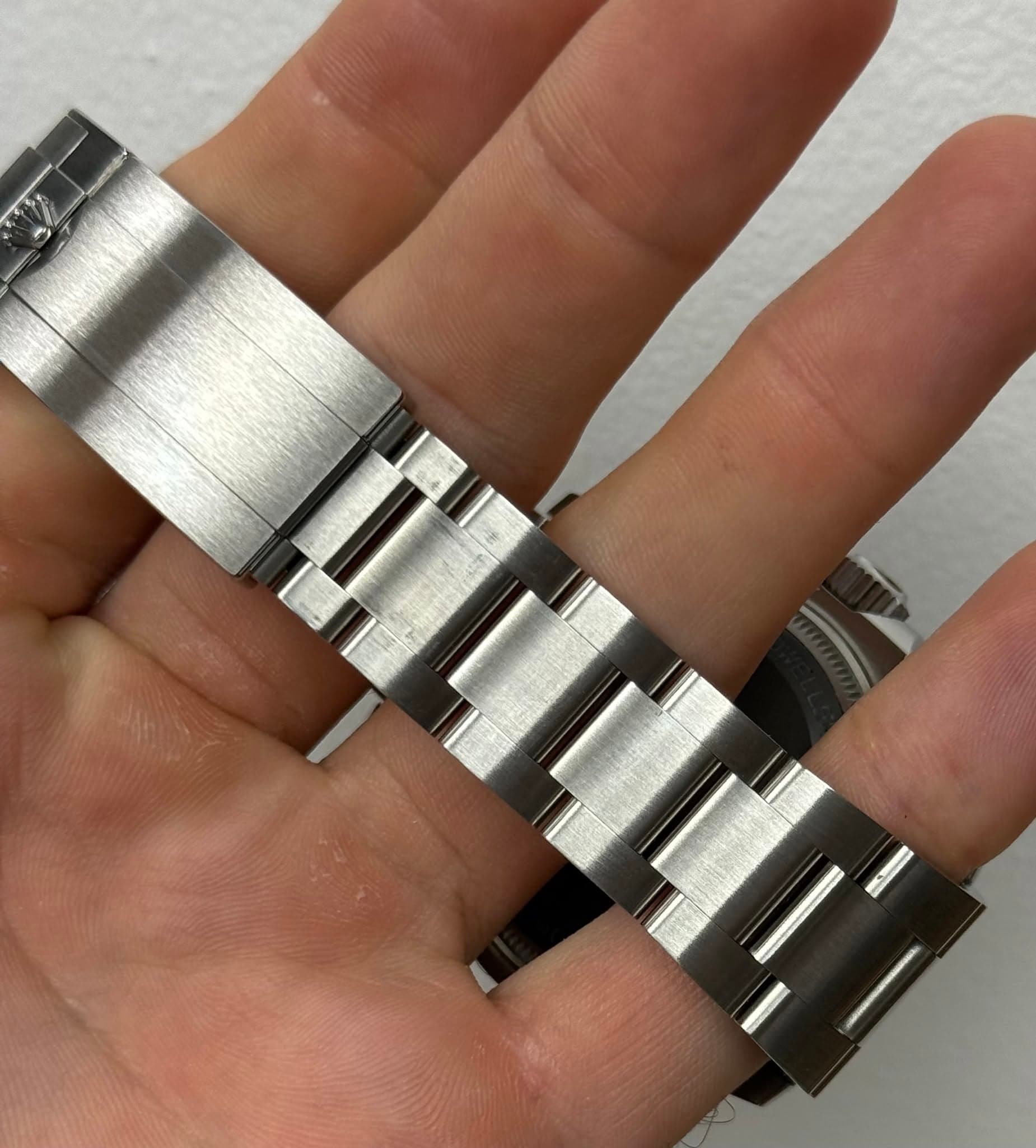 May be an image of wrist watch