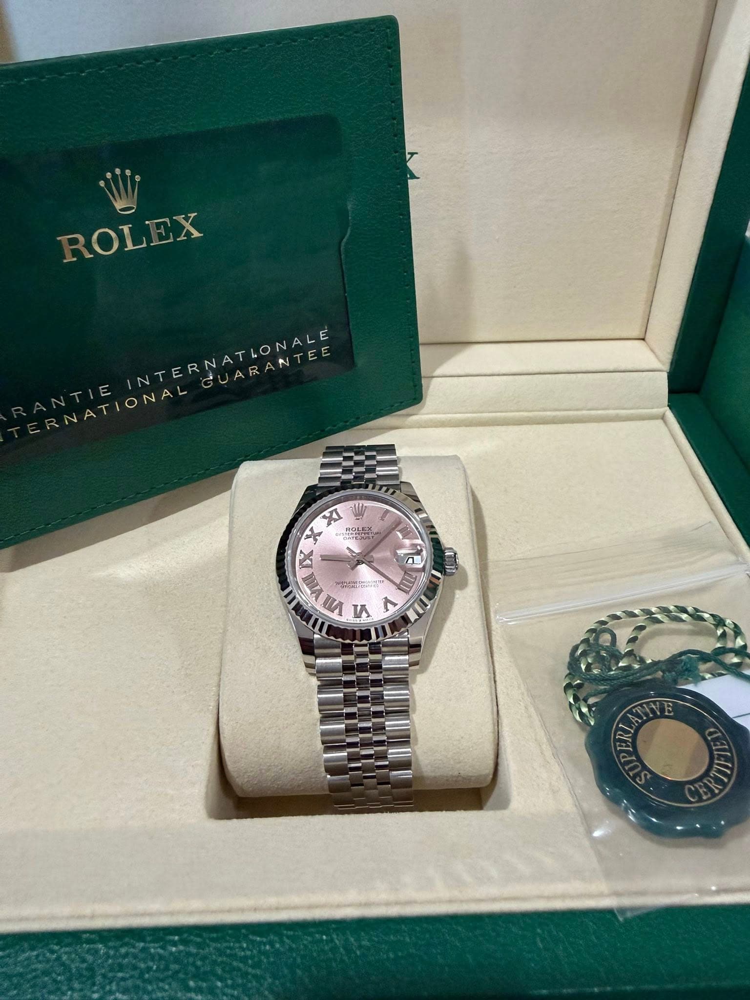 May be an image of wrist watch and text that says 'ROLEX LONALE XI + 出 S0 XX ว حن 있은 0 (A S < ٢'
