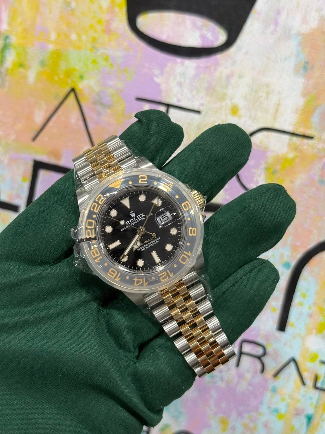 May be an image of wrist watch and text