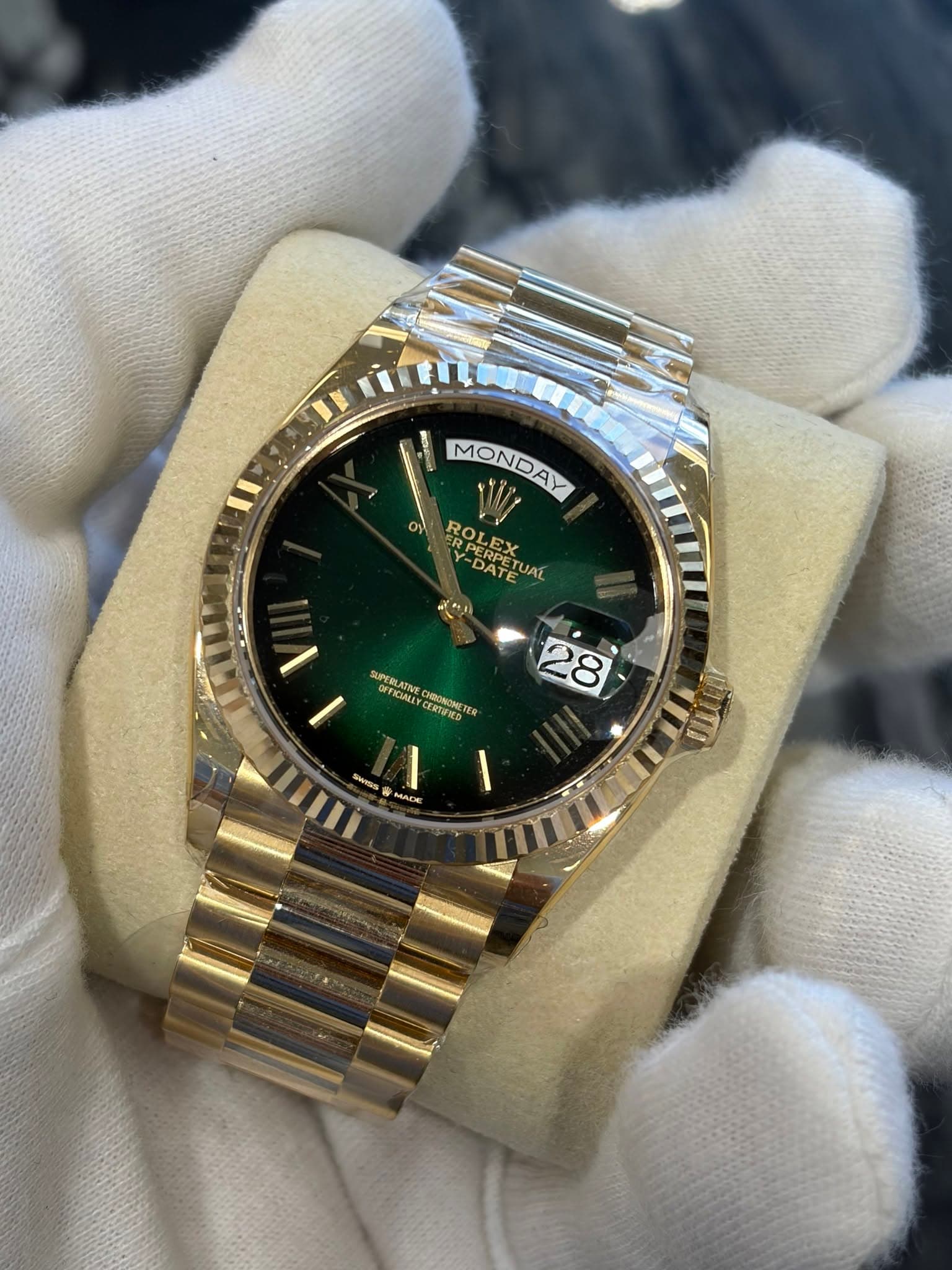 May be an image of wrist watch and text