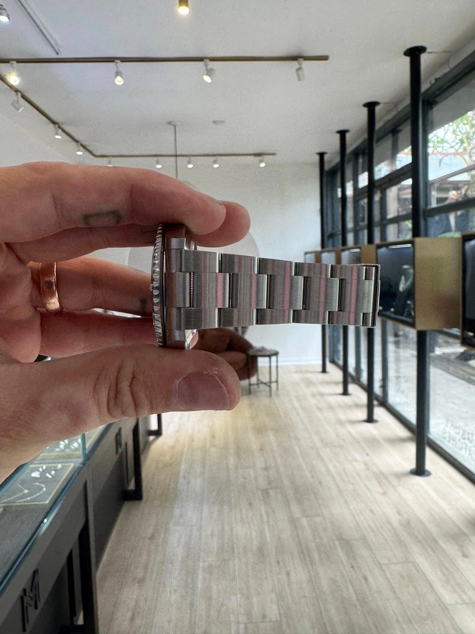May be an image of wrist watch
