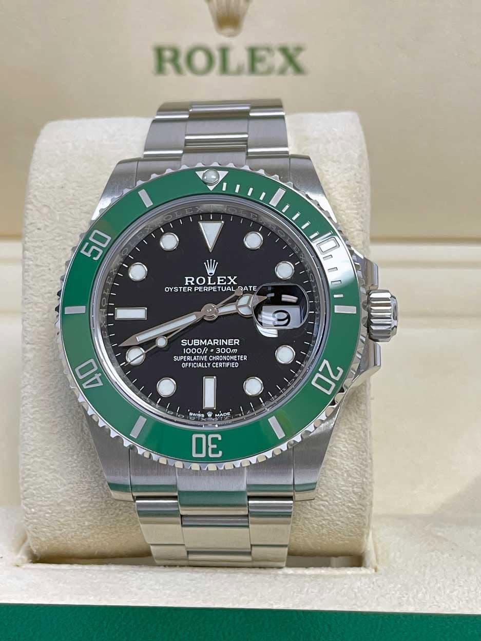 May be an image of wrist watch and text that says 'ROLEX 50 ROLEX OYSTER PERPET OYSTERPERPETUALRATE UAL RATE 10, 3 SUBMARINER 1000f SUPERLATIV SUPERLATINE.CHRONONETER CUCSOLATIVE…