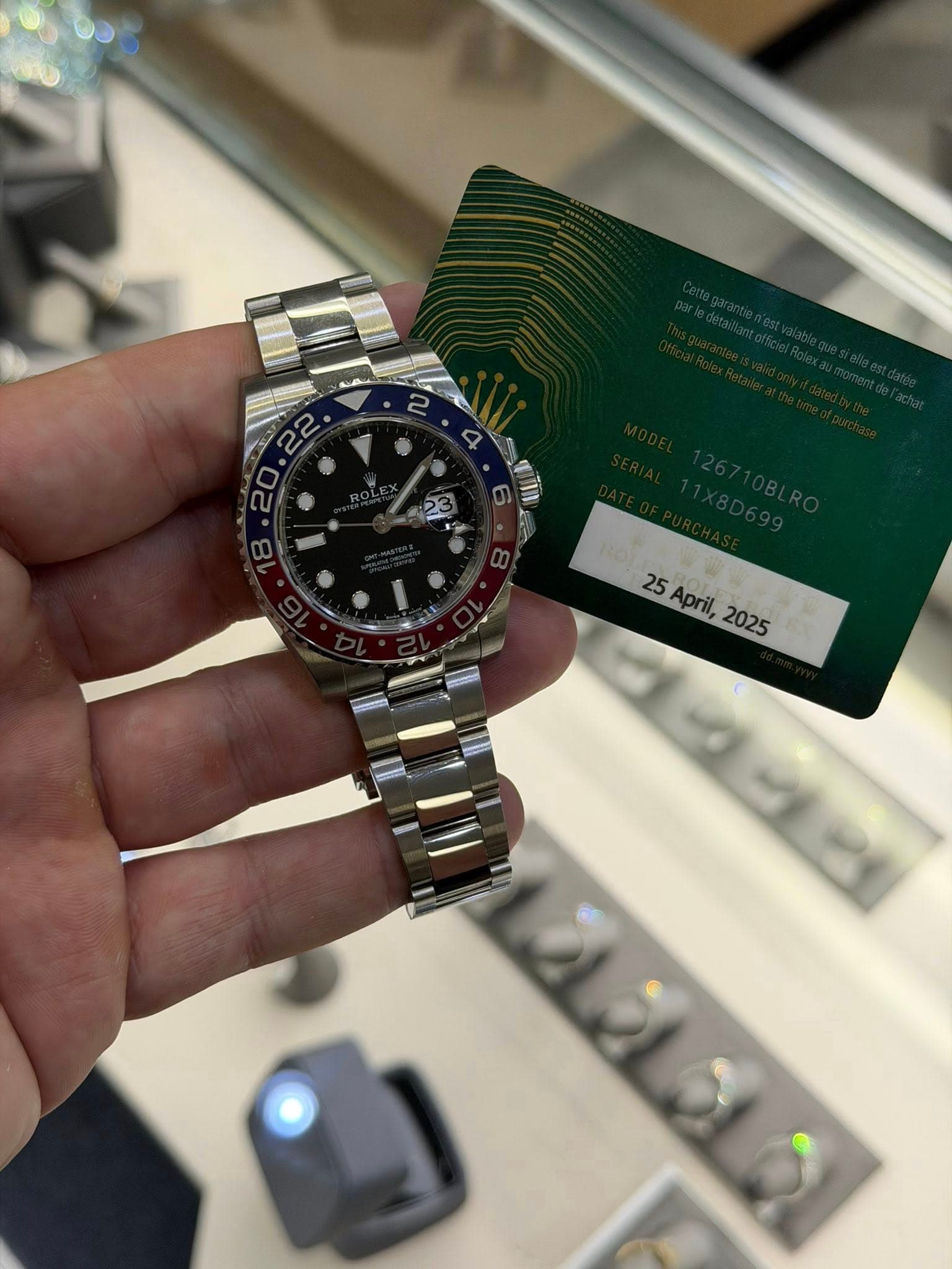 May be an image of wrist watch and text
