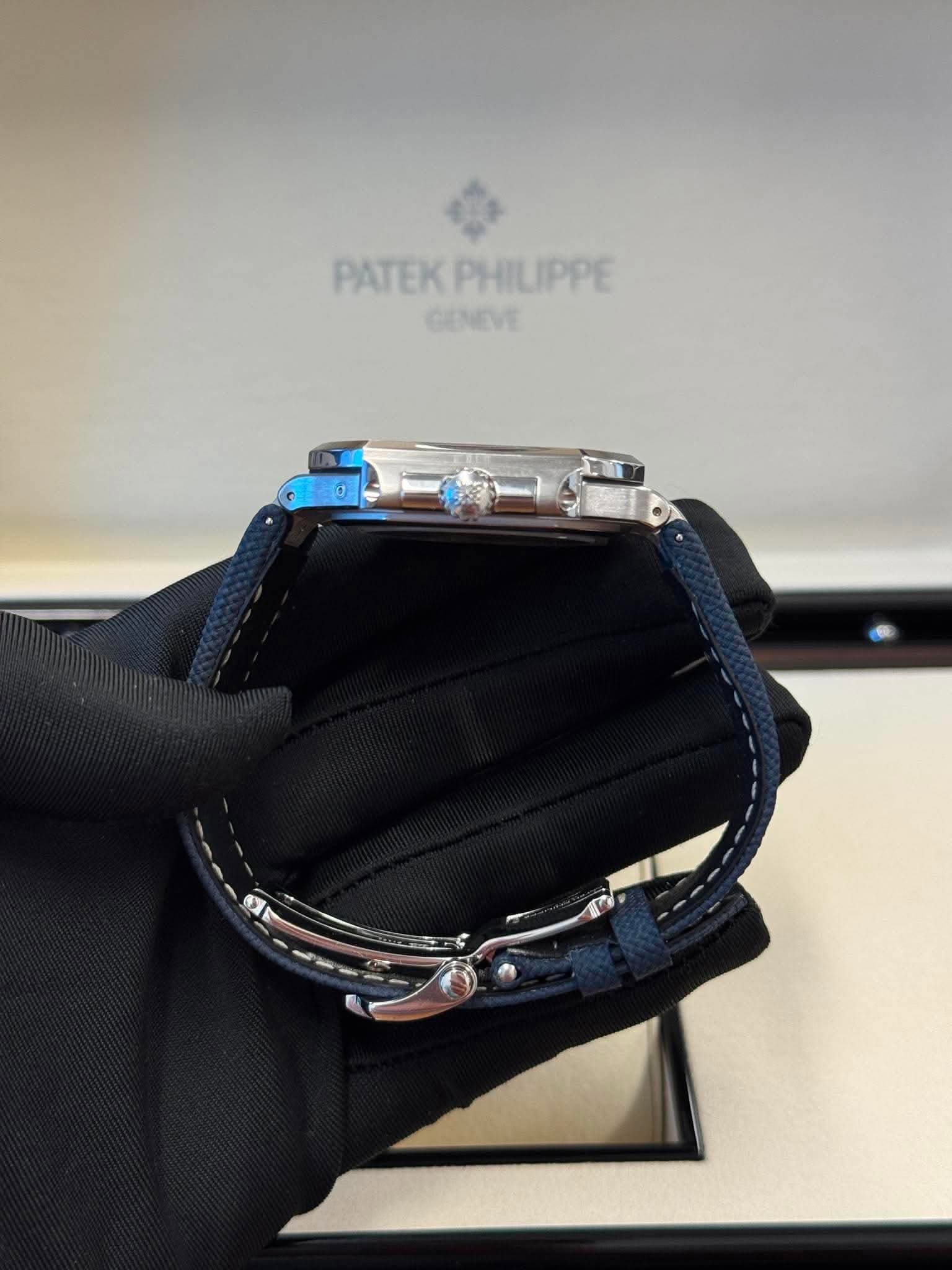 May be an image of wrist watch and text that says 'PATEKPHILIPPE PATEK KPHILIPPE GINEVE'