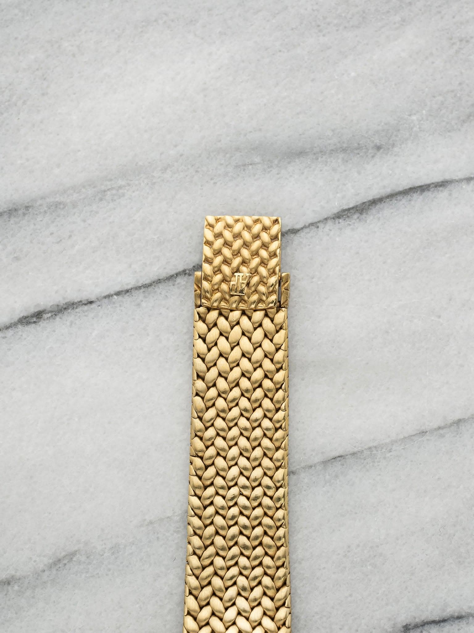 May be an image of wrist watch