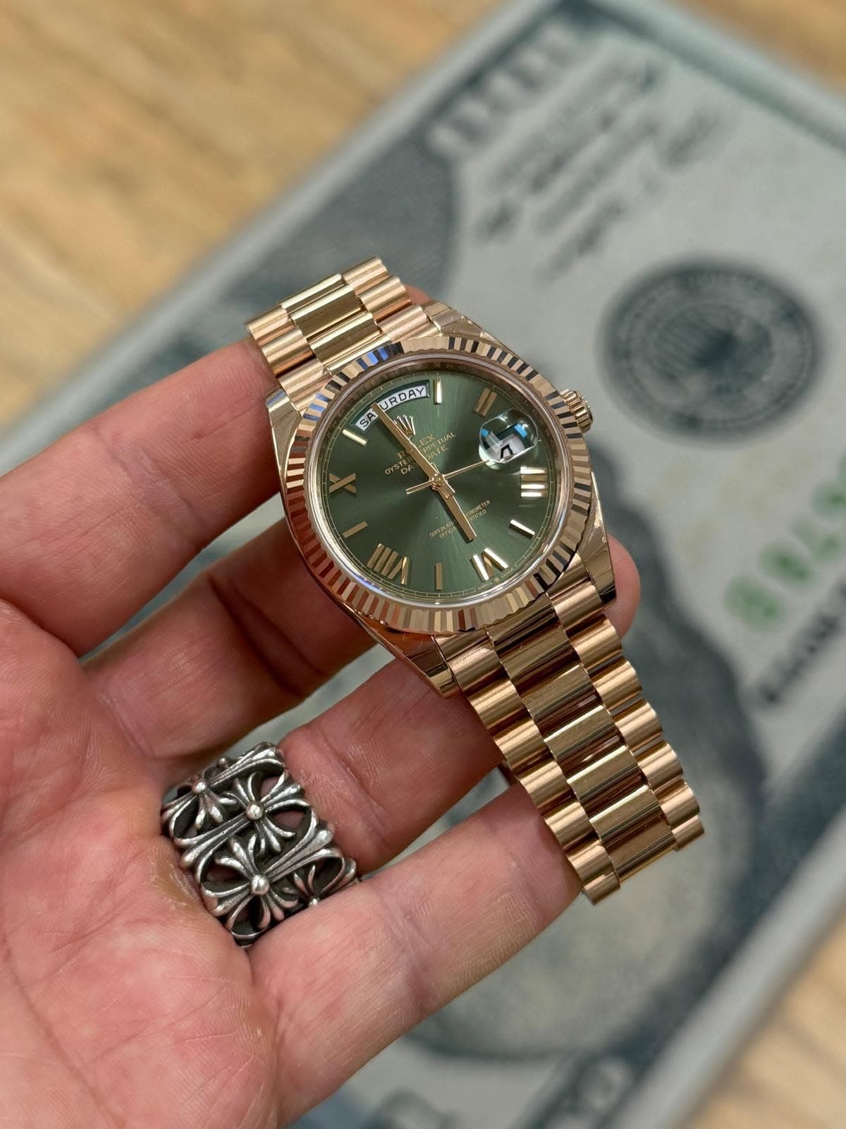 May be an image of wrist watch and text