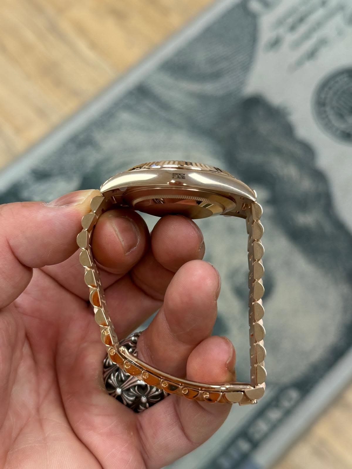 May be an image of wrist watch and jewelry