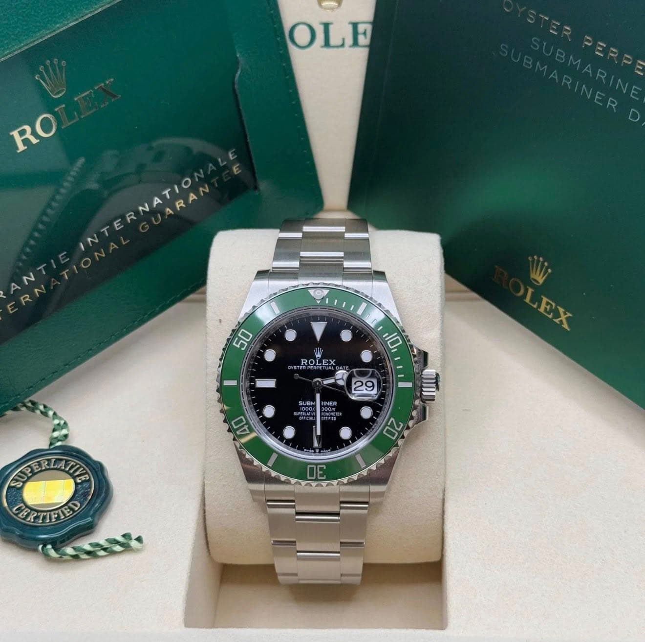 May be an image of wrist watch and text that says 'OLF RO INTERNATIO RA NT 50 ROLEX ROLEX 10 EX SUEM 29 p 40 MnI 20 SUPERIATIP CERTIFIED 3'