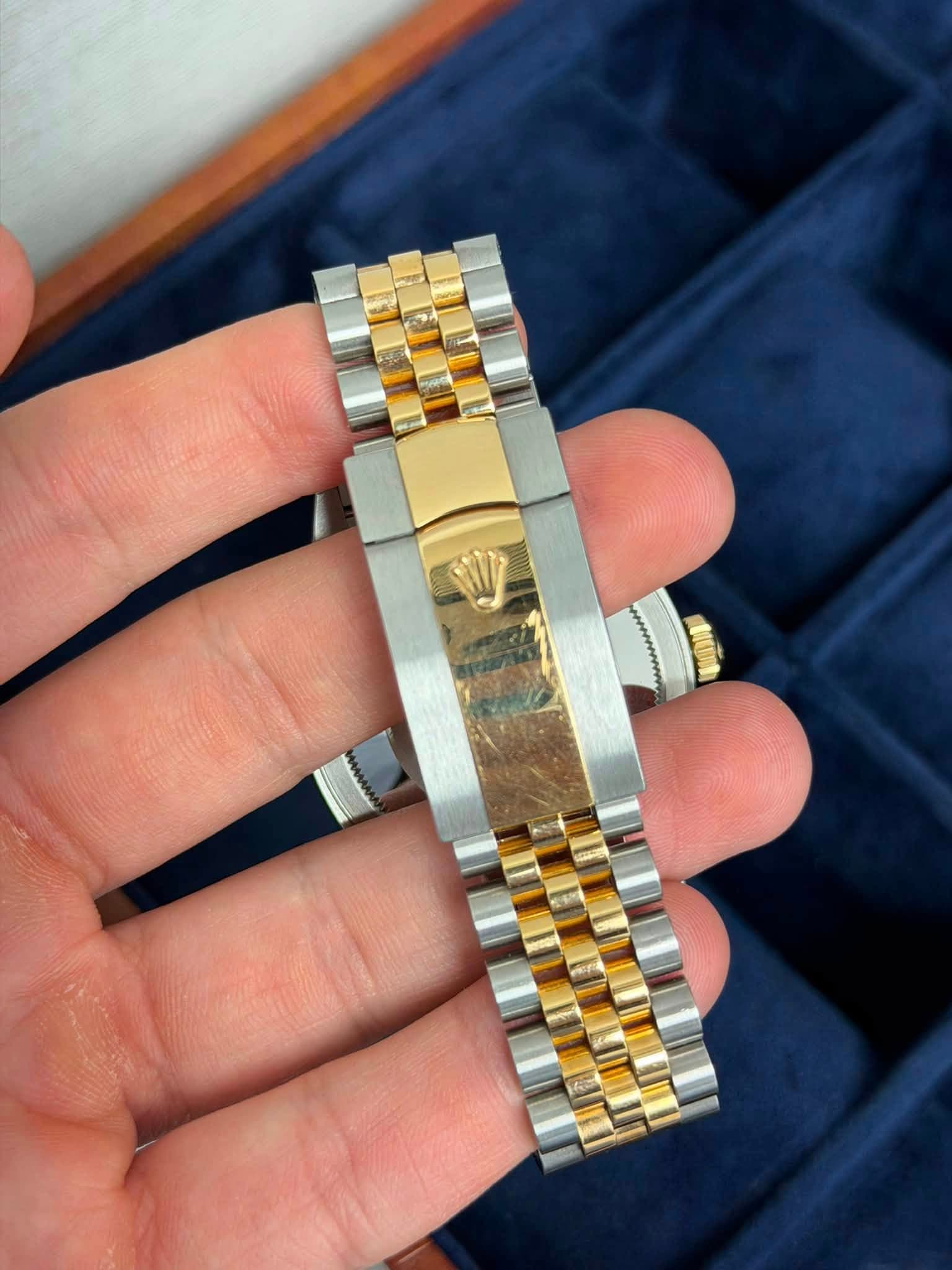 May be an image of wrist watch