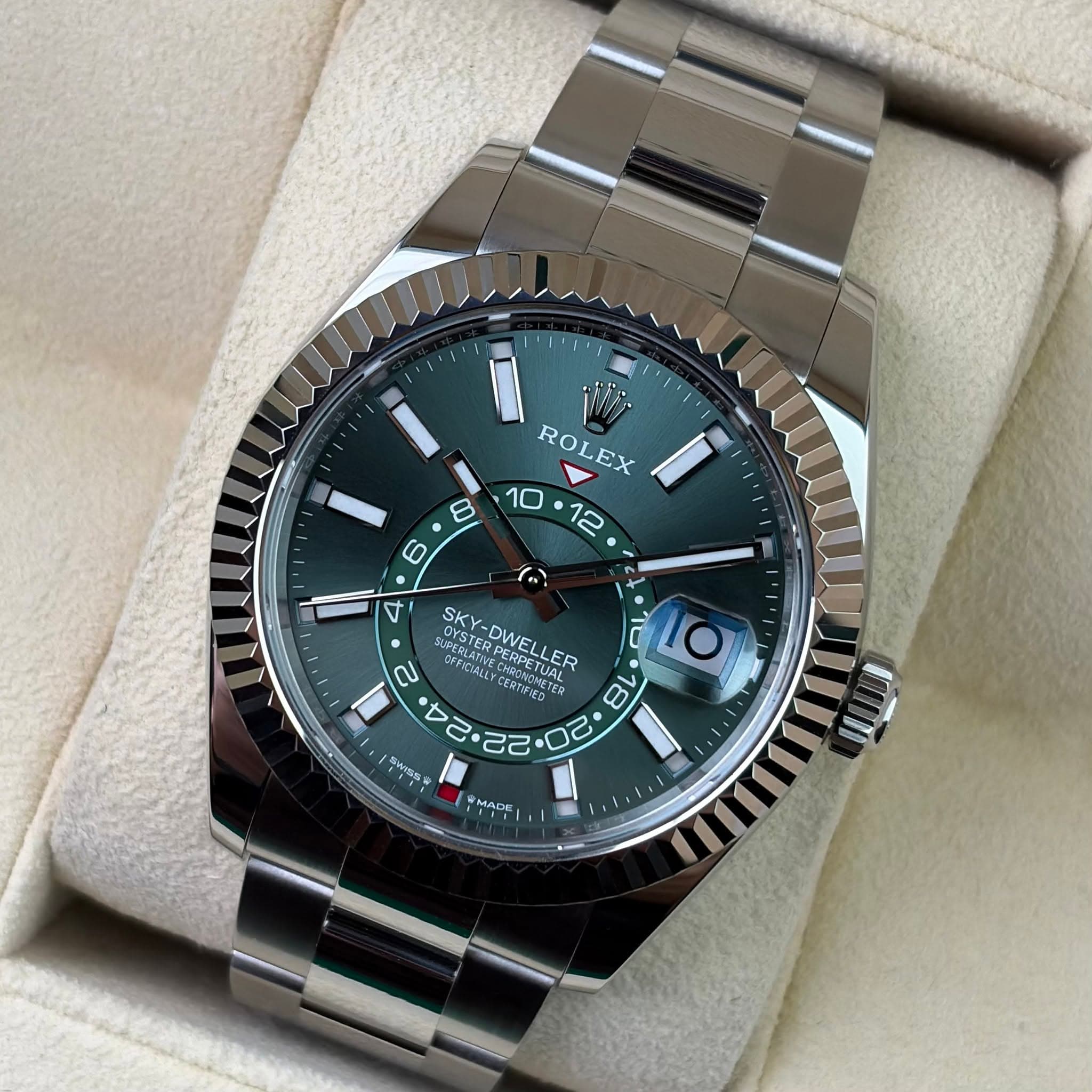 May be an image of wrist watch and text