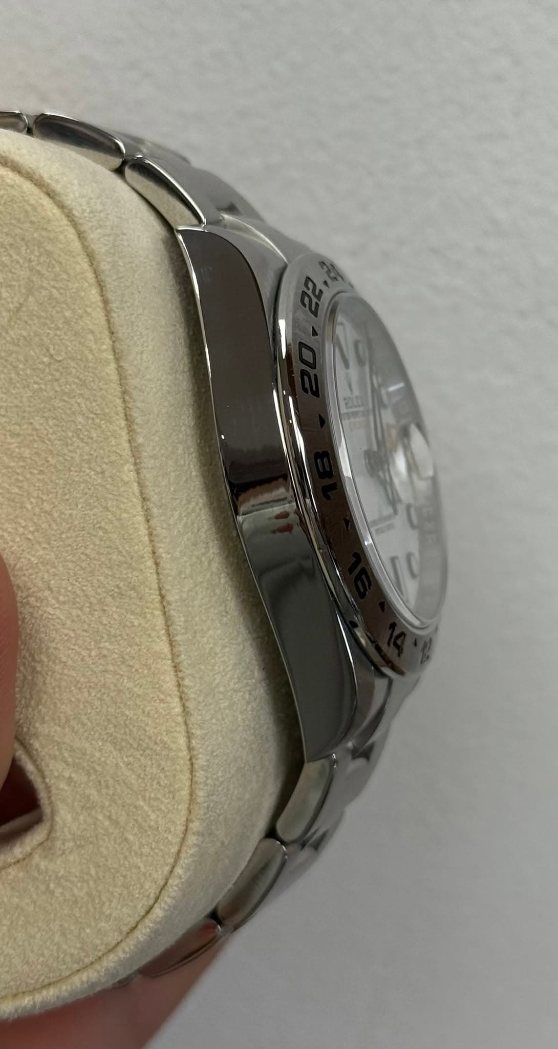 May be an image of wrist watch