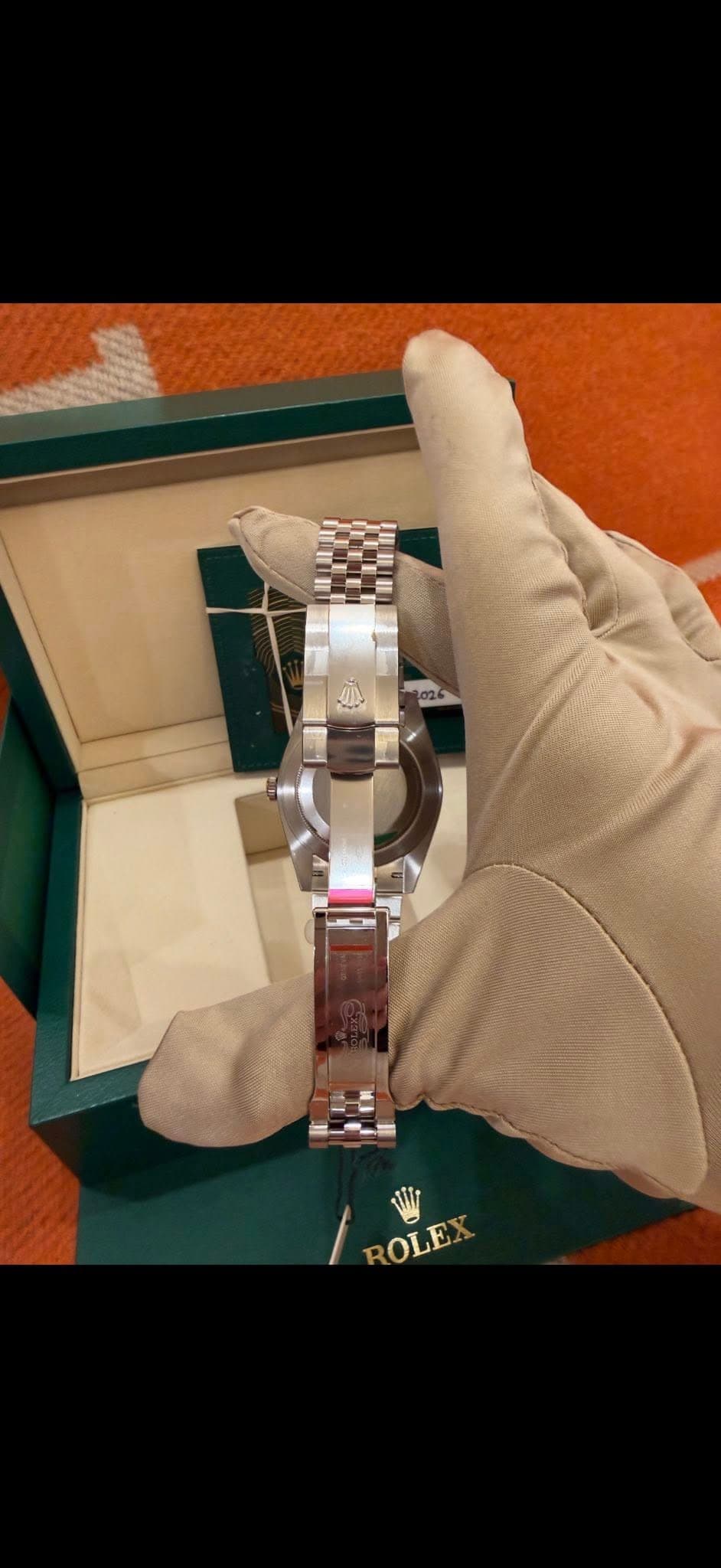 May be an image of wrist watch and text that says 'ROLEX ROLE'