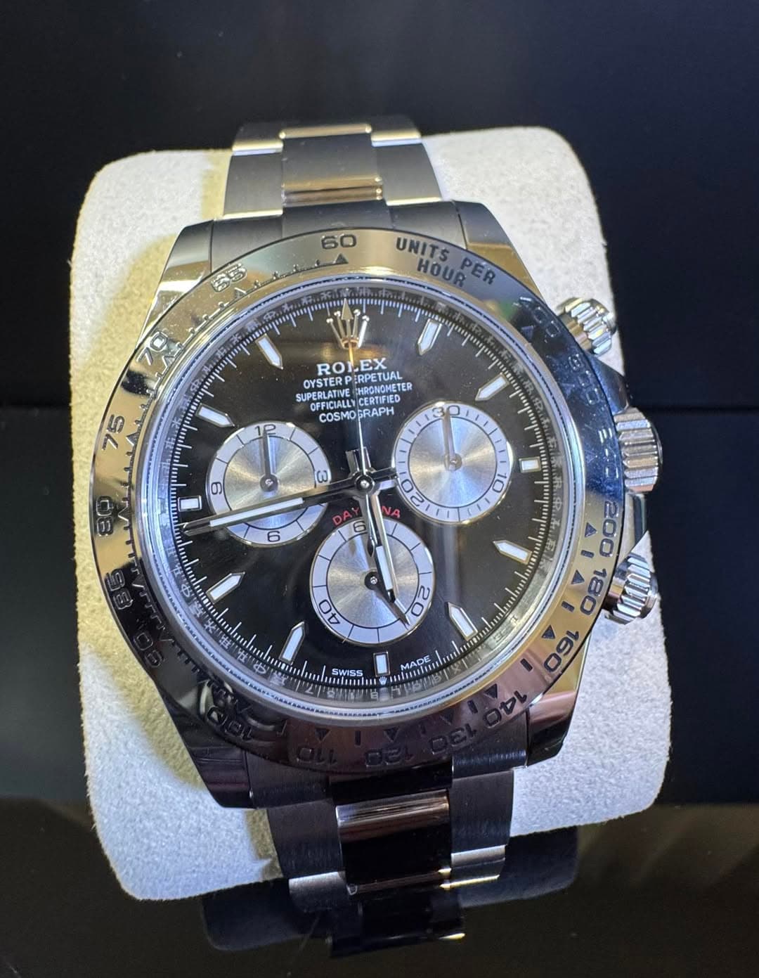 May be an image of wrist watch and text