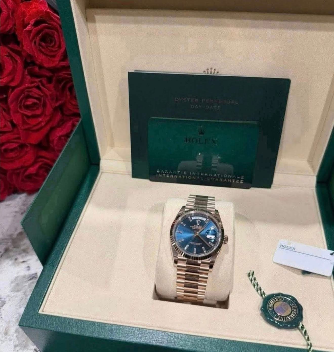 May be an image of wrist watch and text that says 'للند ROL ROLEX EMLS'