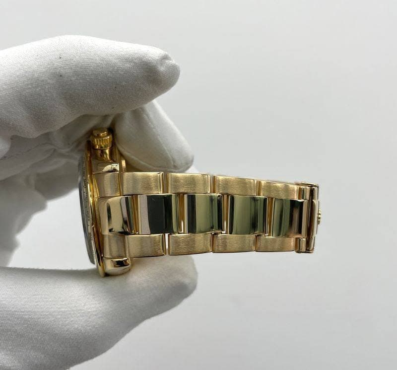 May be an image of wrist watch
