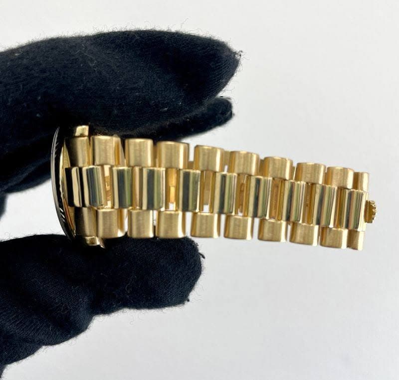 May be an image of wrist watch