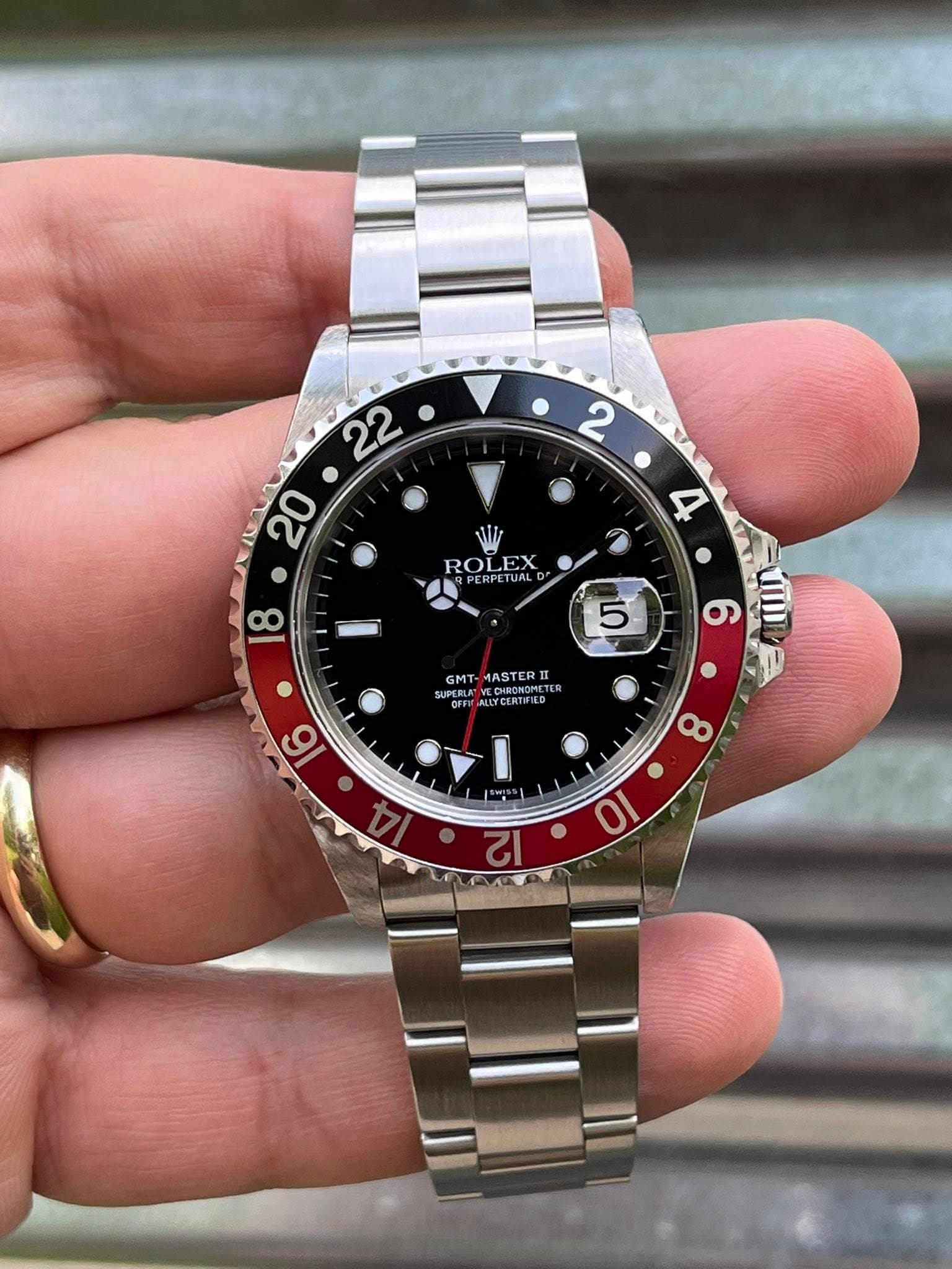 May be an image of wrist watch and text that says ' ROLEX PERPETUAL 18 5 GMT 6 ASTER CHRONOMET MECA MAYCLATE CERTEIL 6 • 8 10'